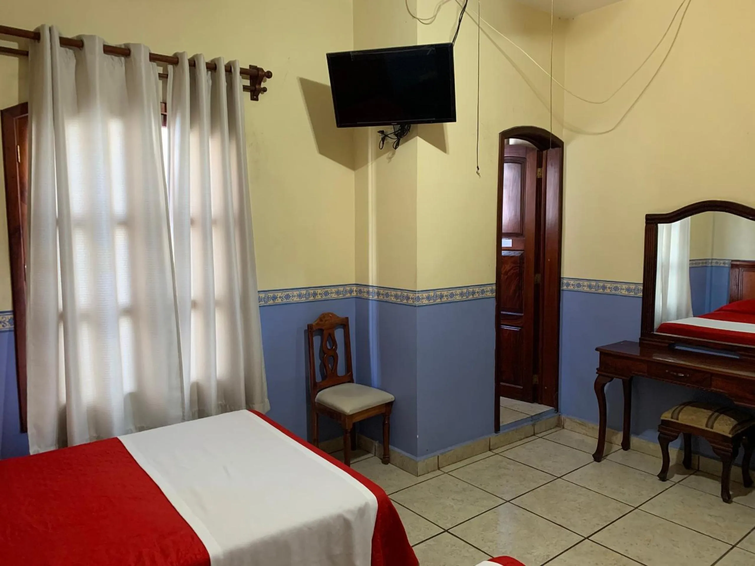 Bedroom in OYO Hotel Real de Cortés