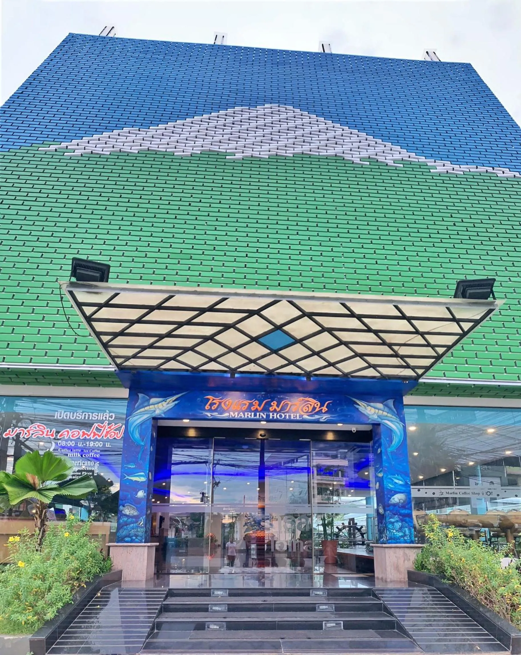 Property logo or sign in Marlin Hotel