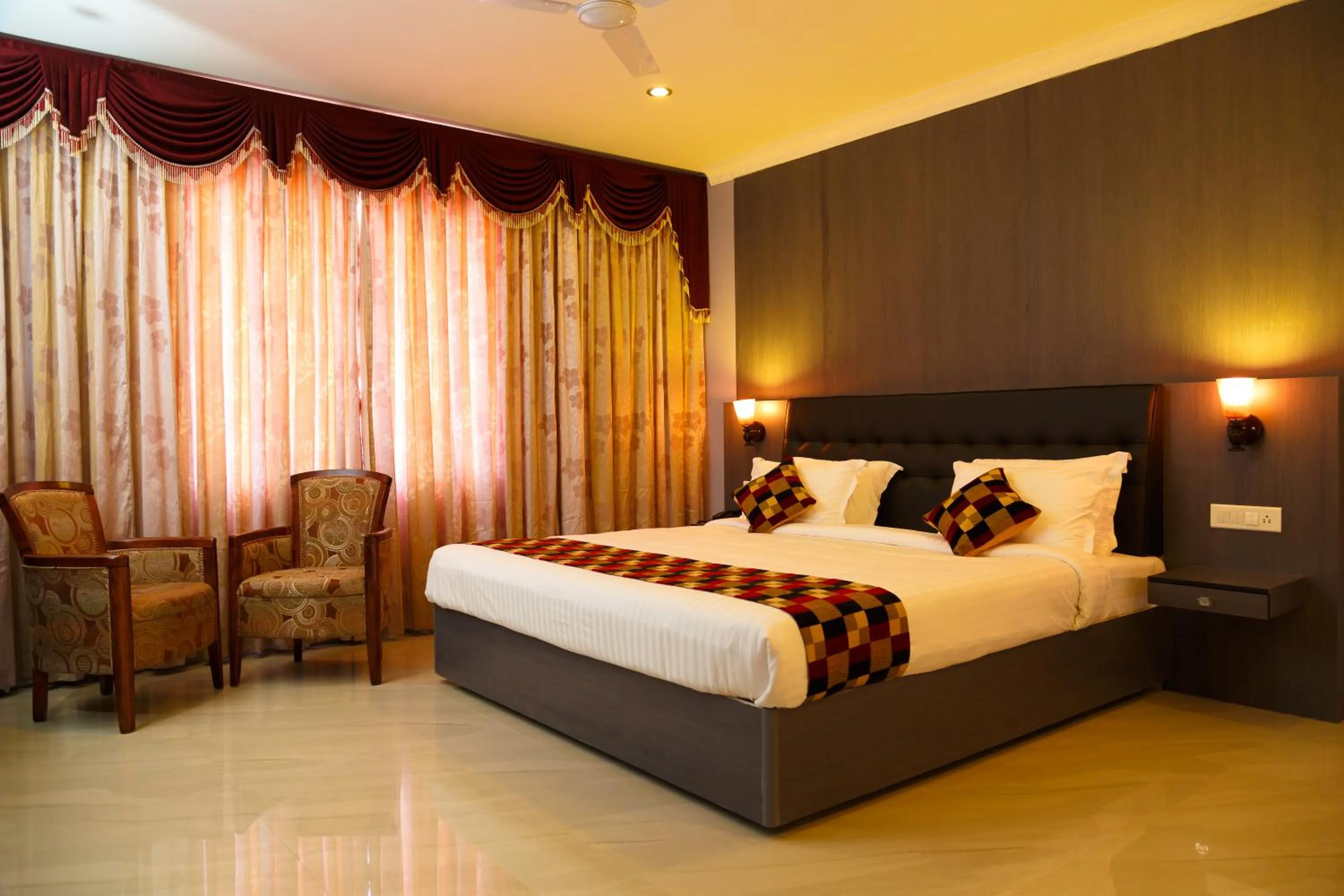 Bed in Hotel Gopalapuram International