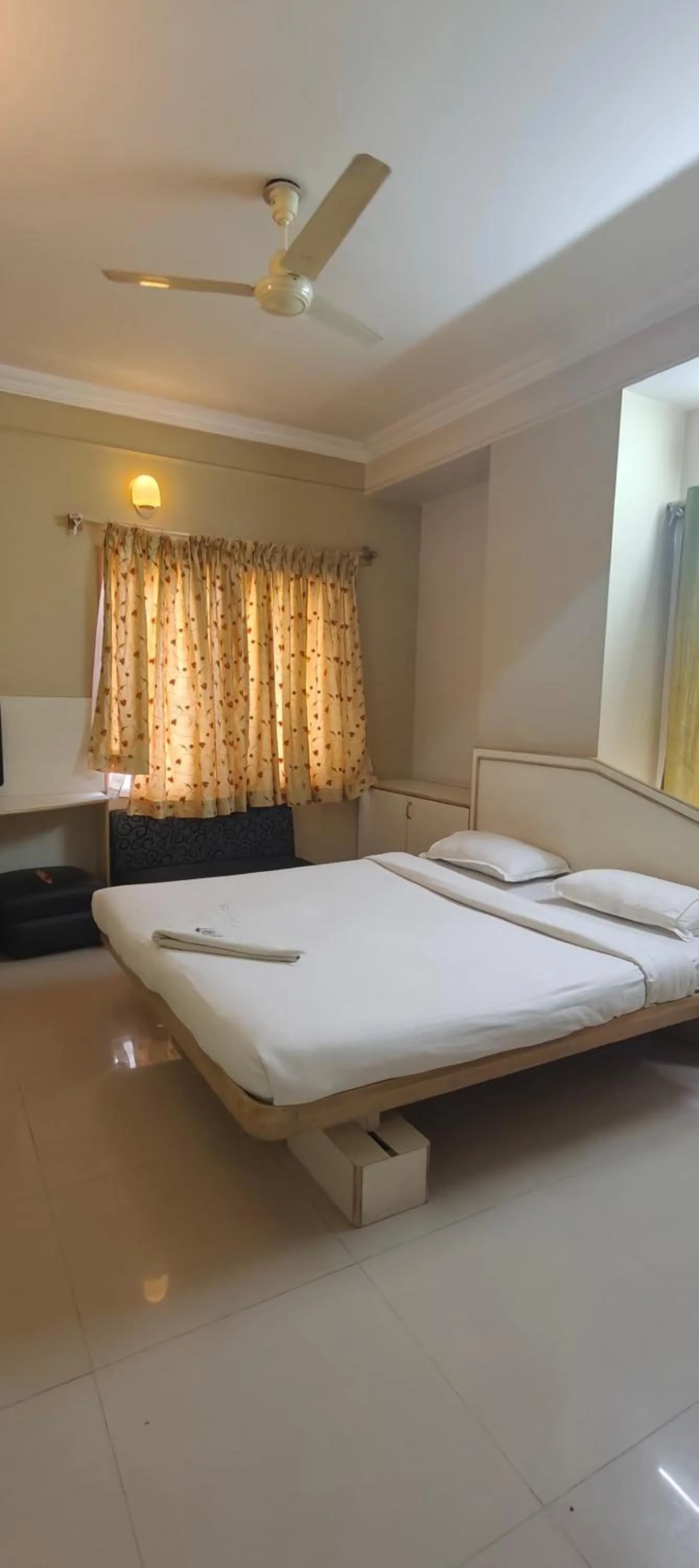 Photo of the whole room, Bed in The Corporate Comforts