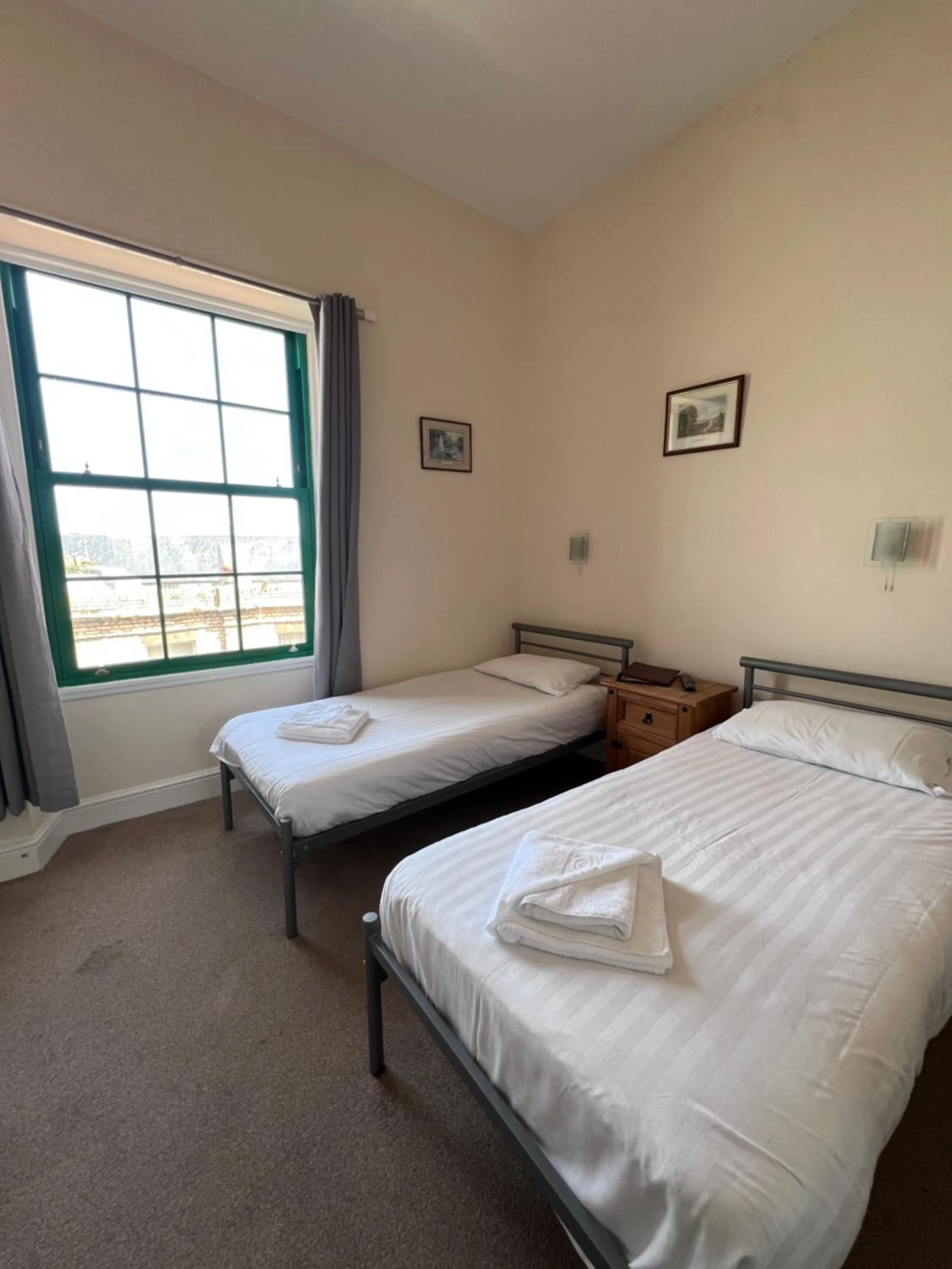 Bed in Royal Britannia Hotel