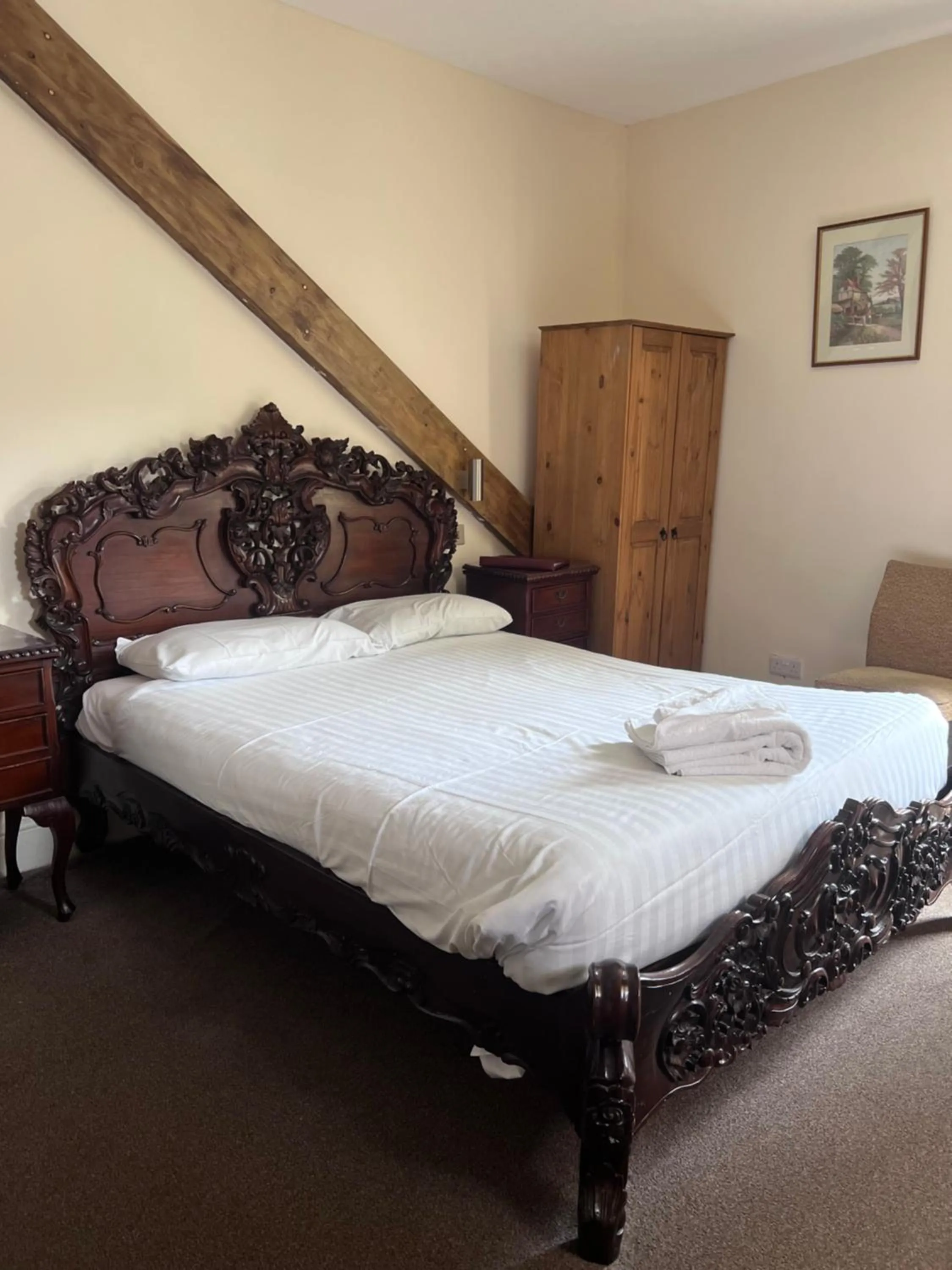 Bed in Royal Britannia Hotel