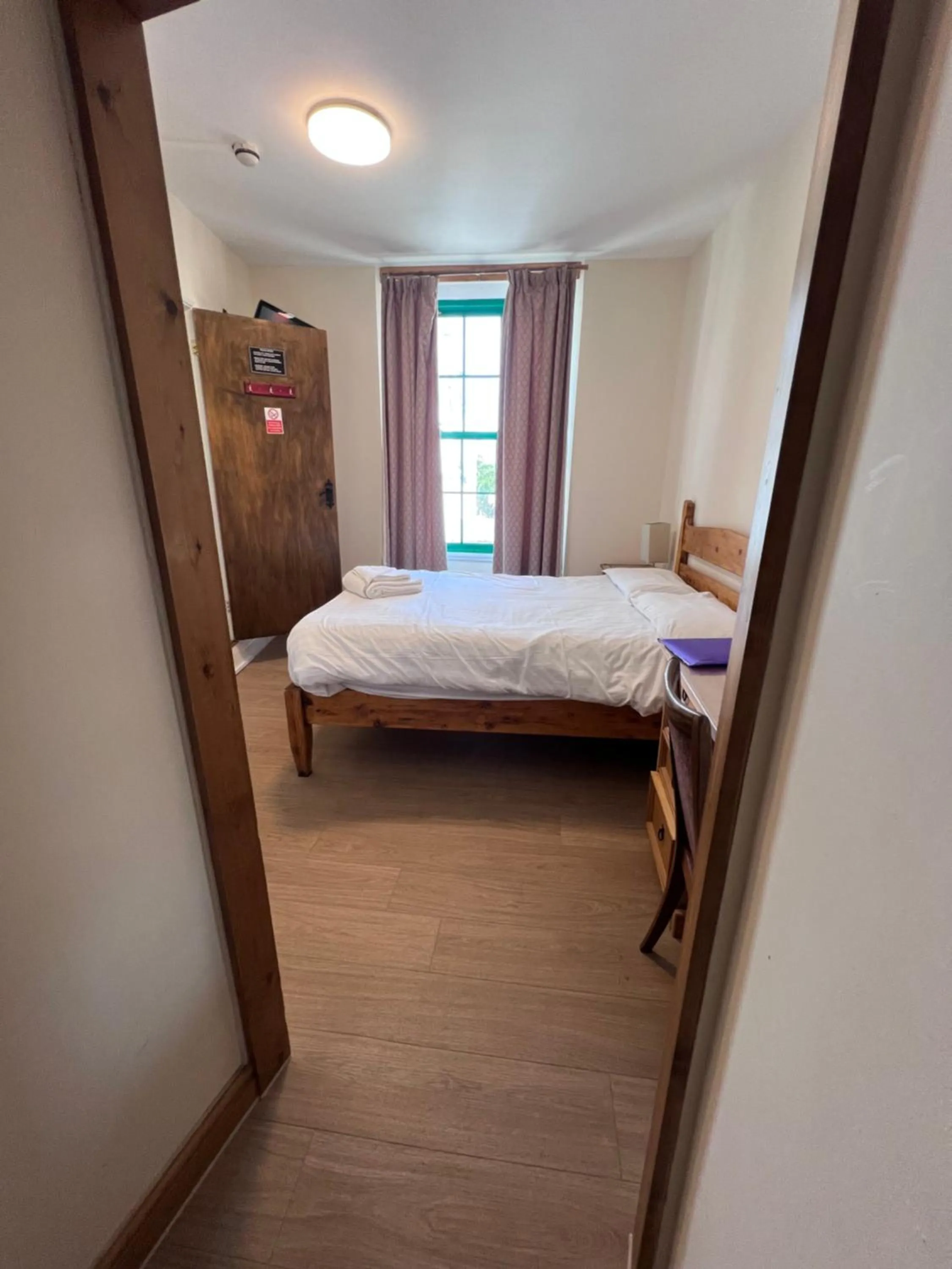 Bed in Royal Britannia Hotel