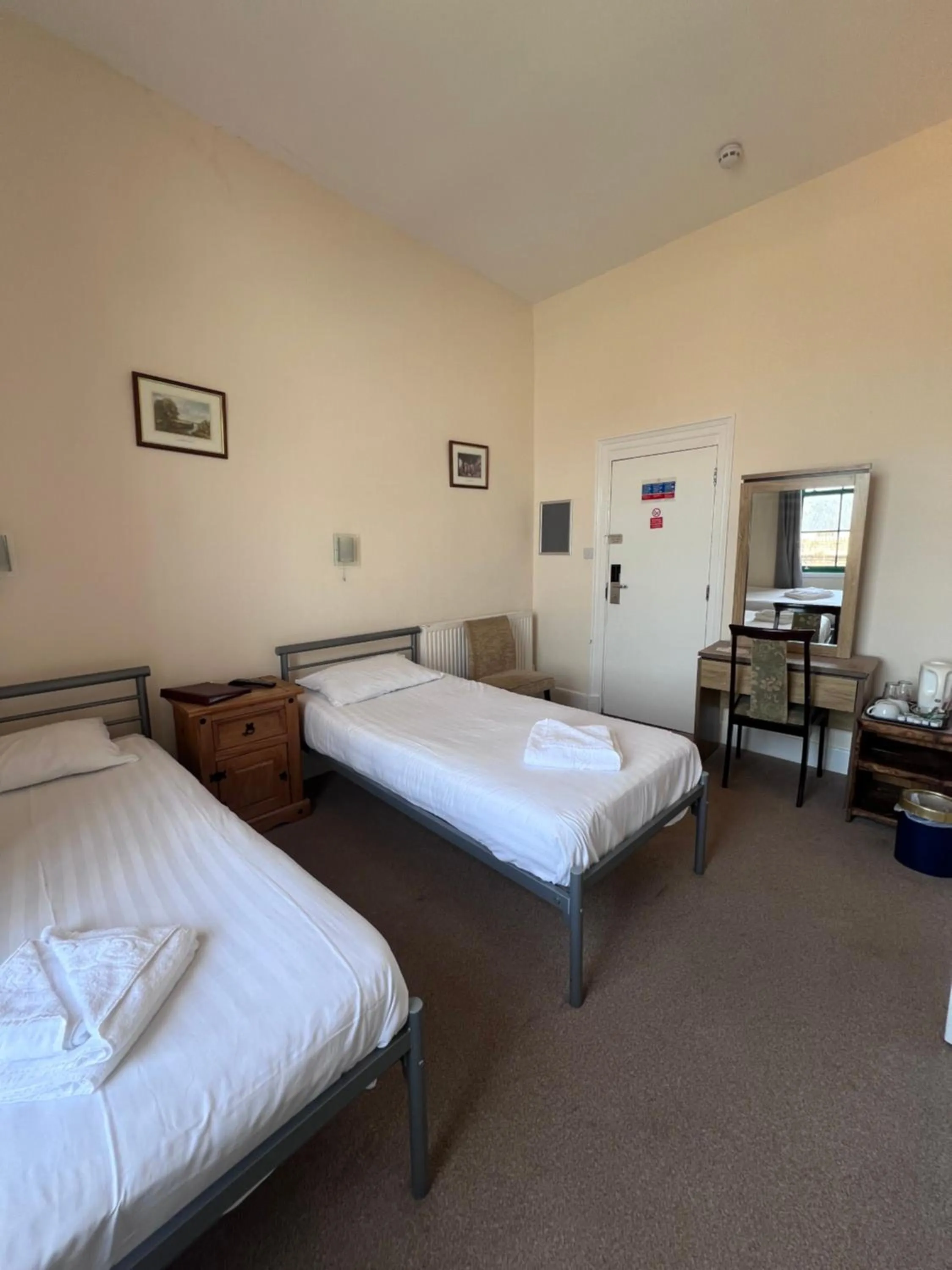 Bed in Royal Britannia Hotel