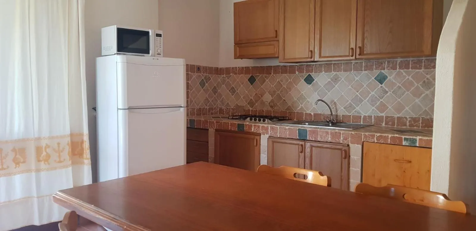 Kitchen or kitchenette in Residence Spiaggia Bianca