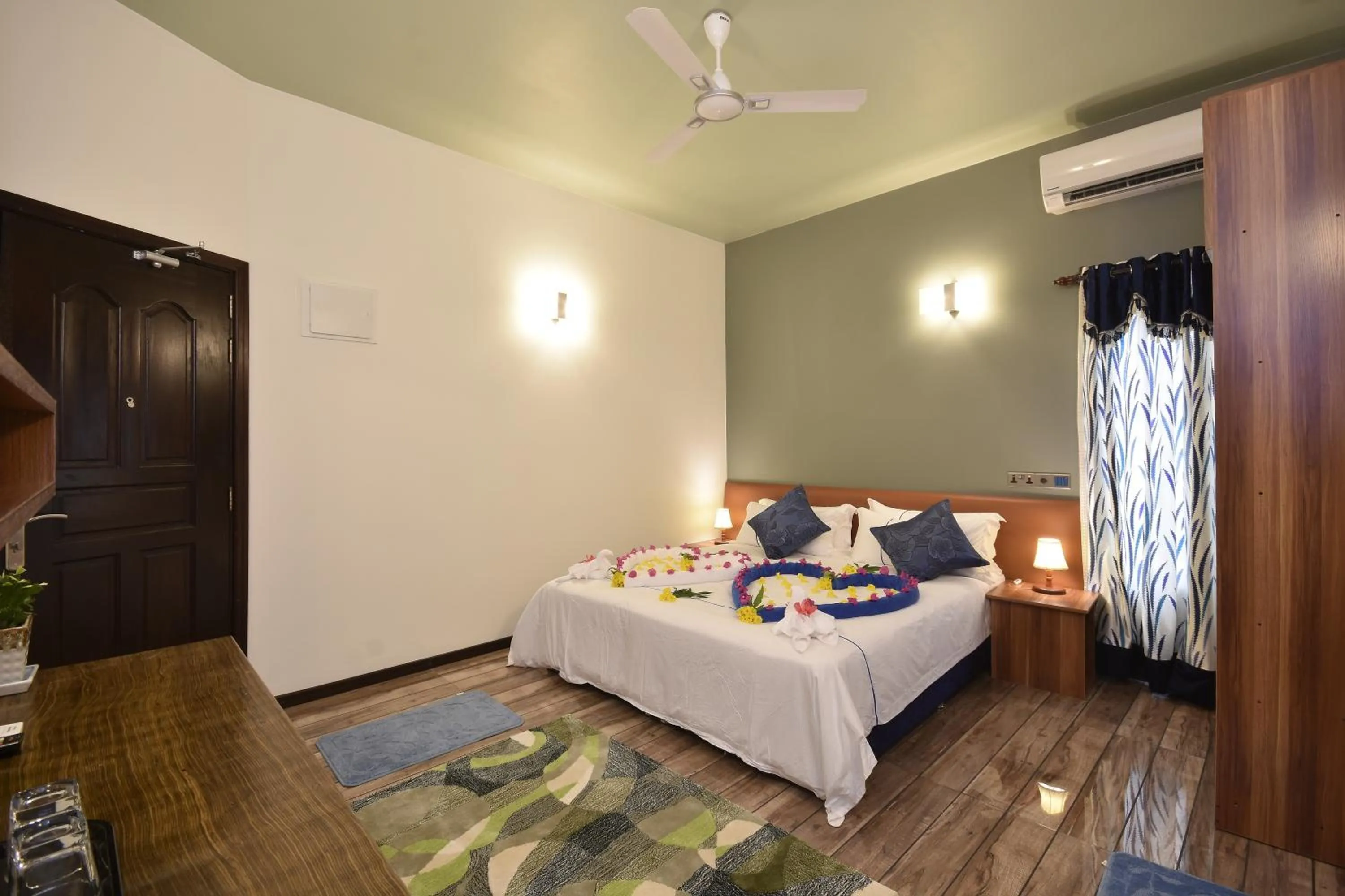 Bed in Island Home Inn