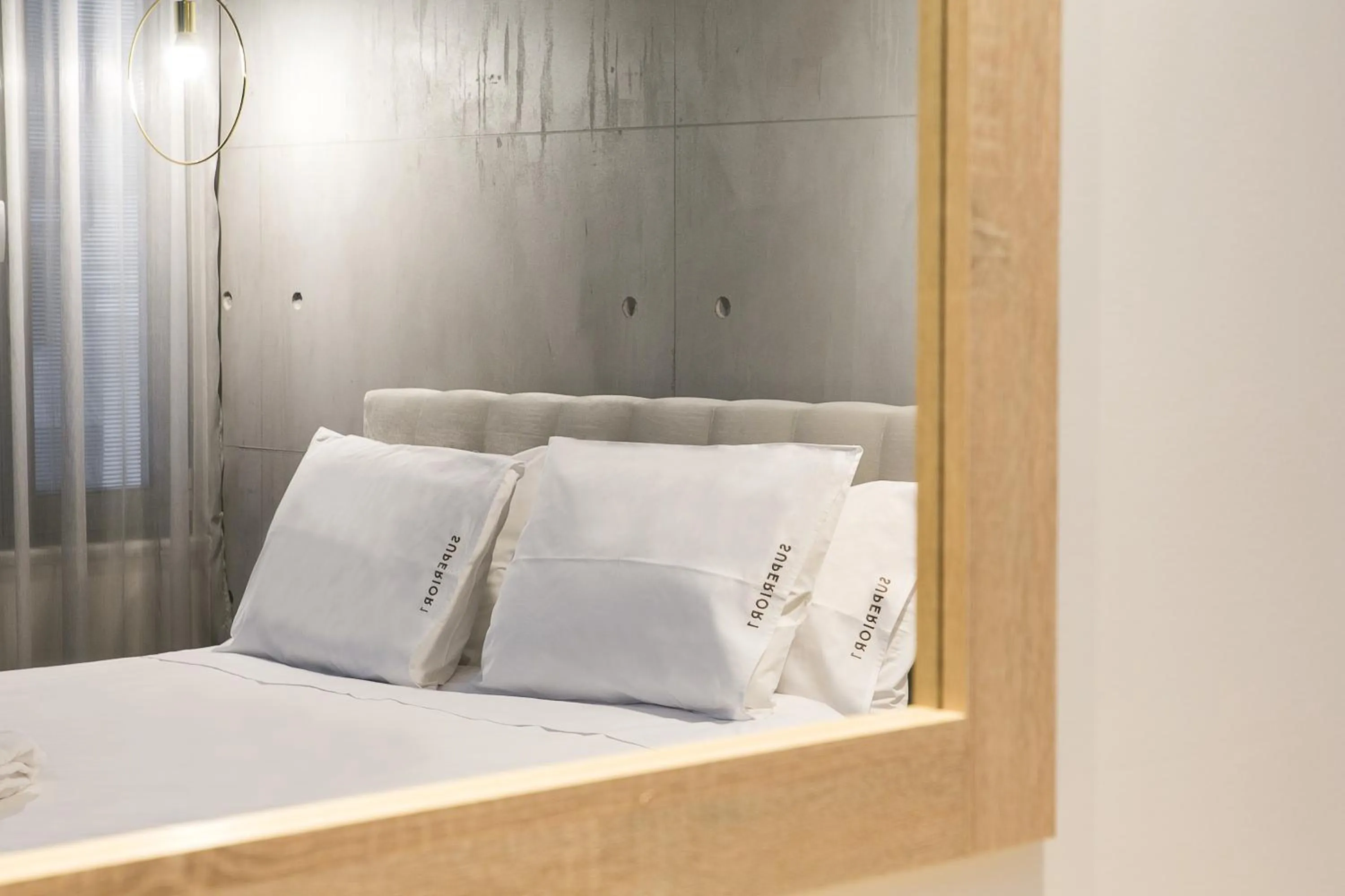 Bed in Superior One Boutique Hotel