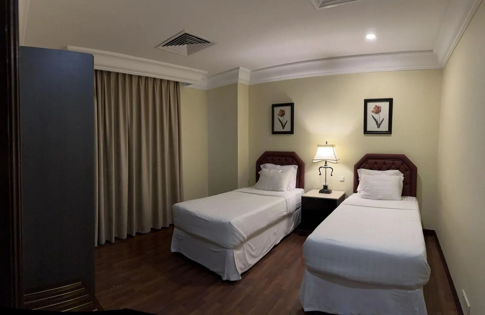 Bed in The Palace Suites