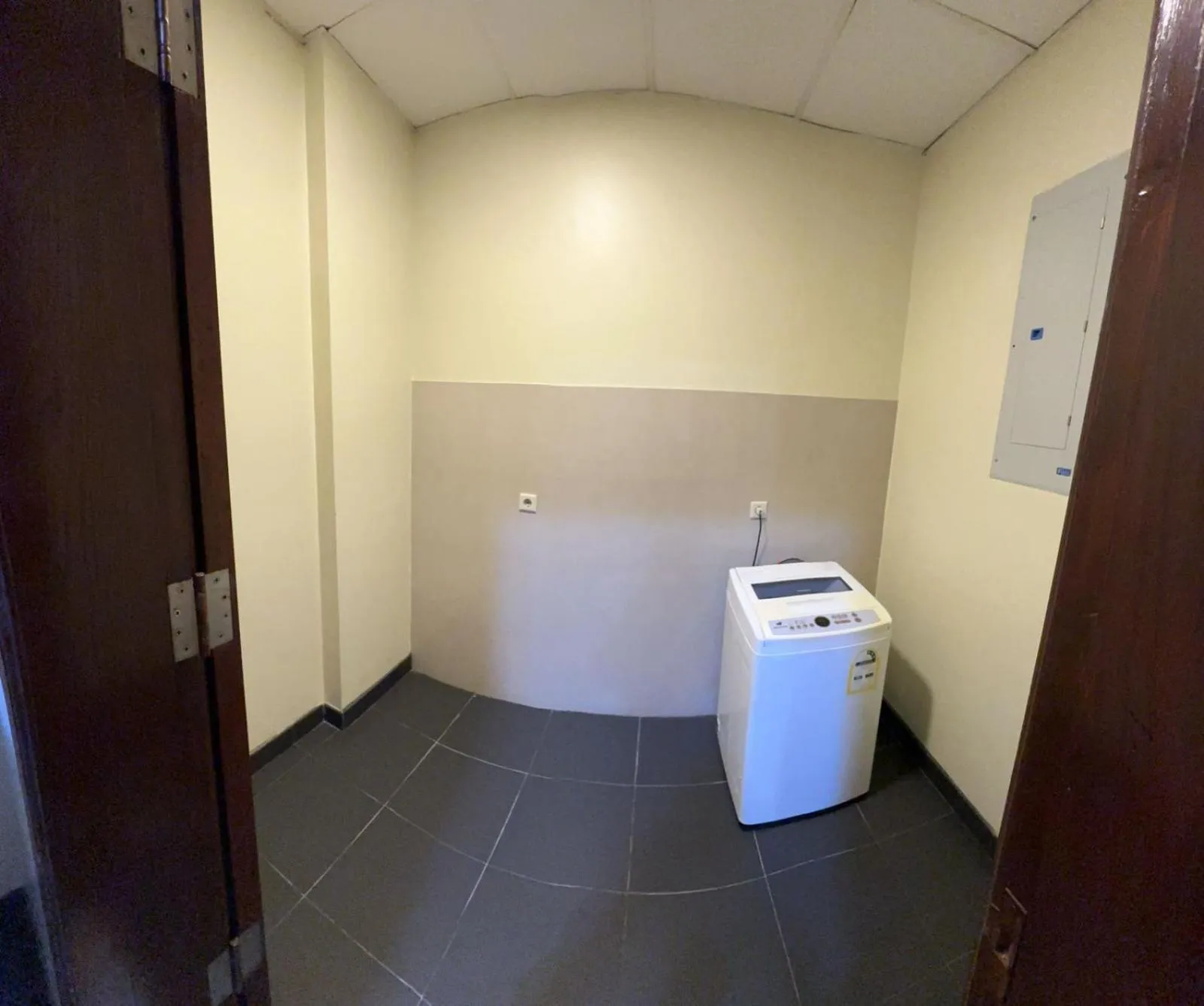 washing machine in The Palace Suites