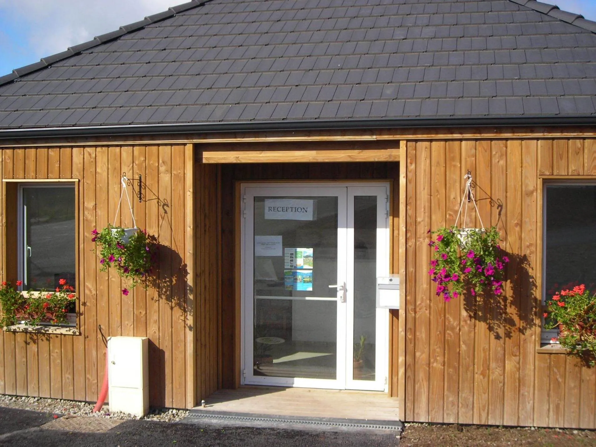 Lobby or reception in Vacancéole - Residence le Domaine du Bosquet
