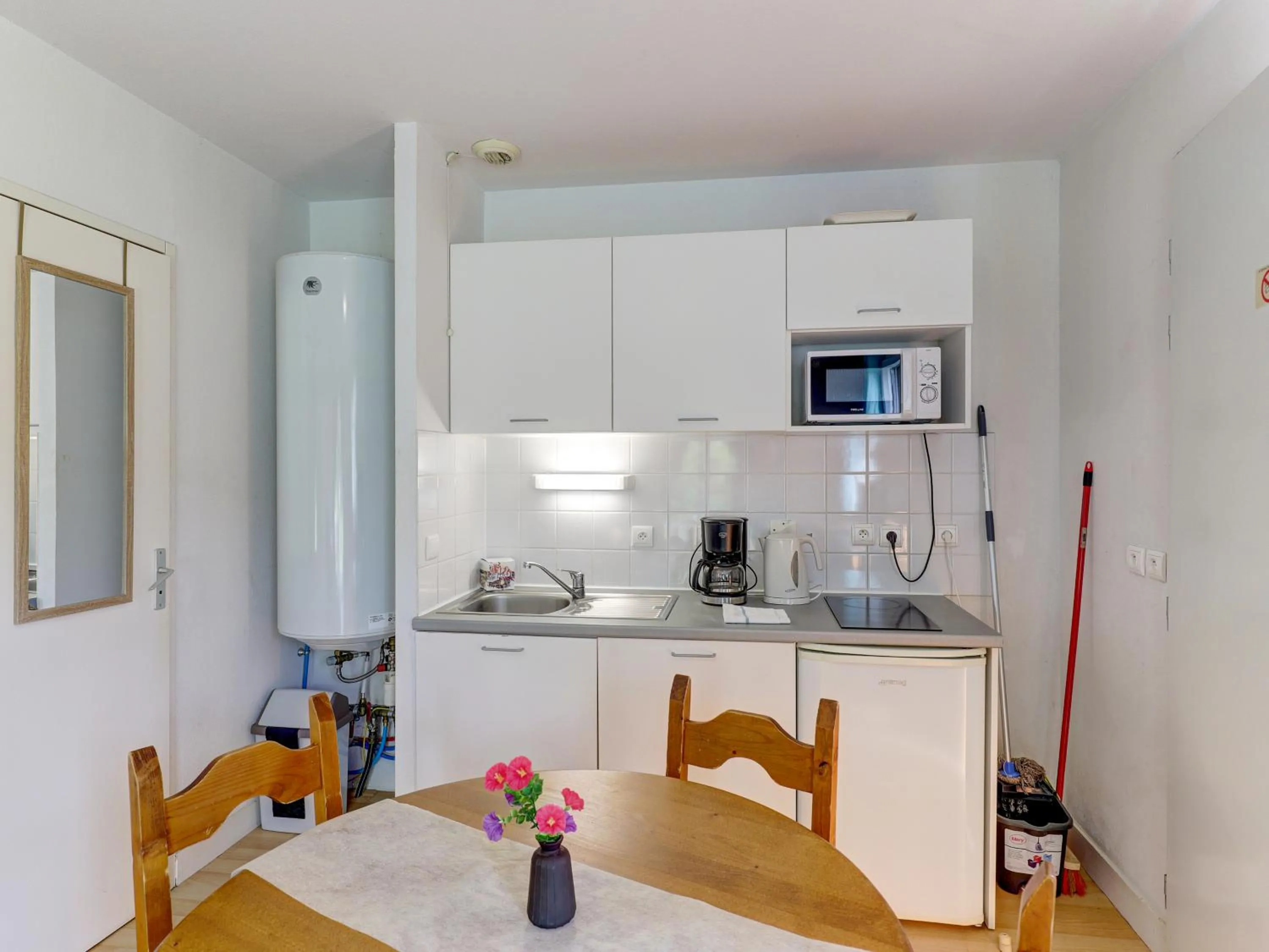 kitchen in Vacancéole - Residence le Domaine du Bosquet