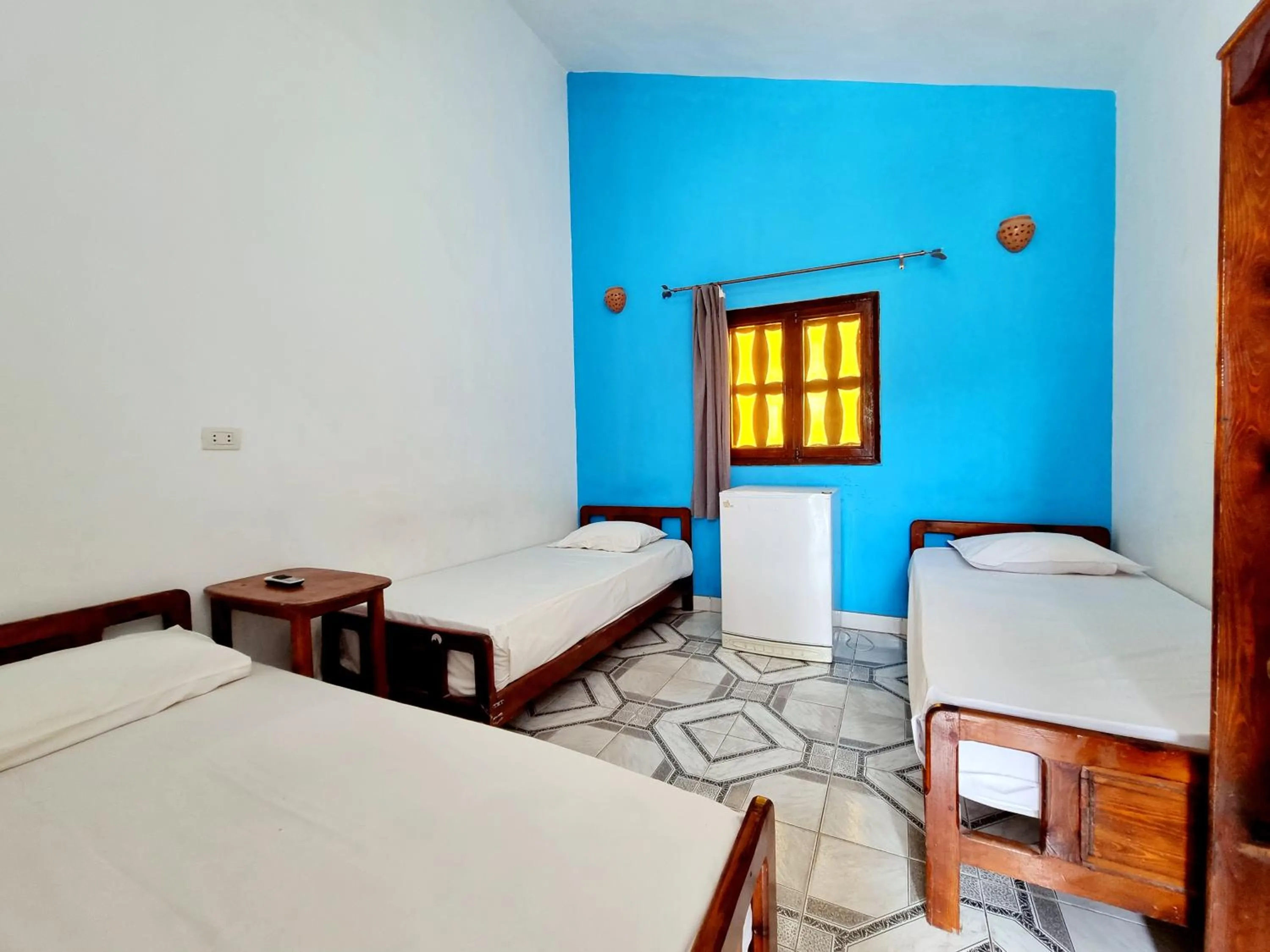 Bed in Jowhara Hotel