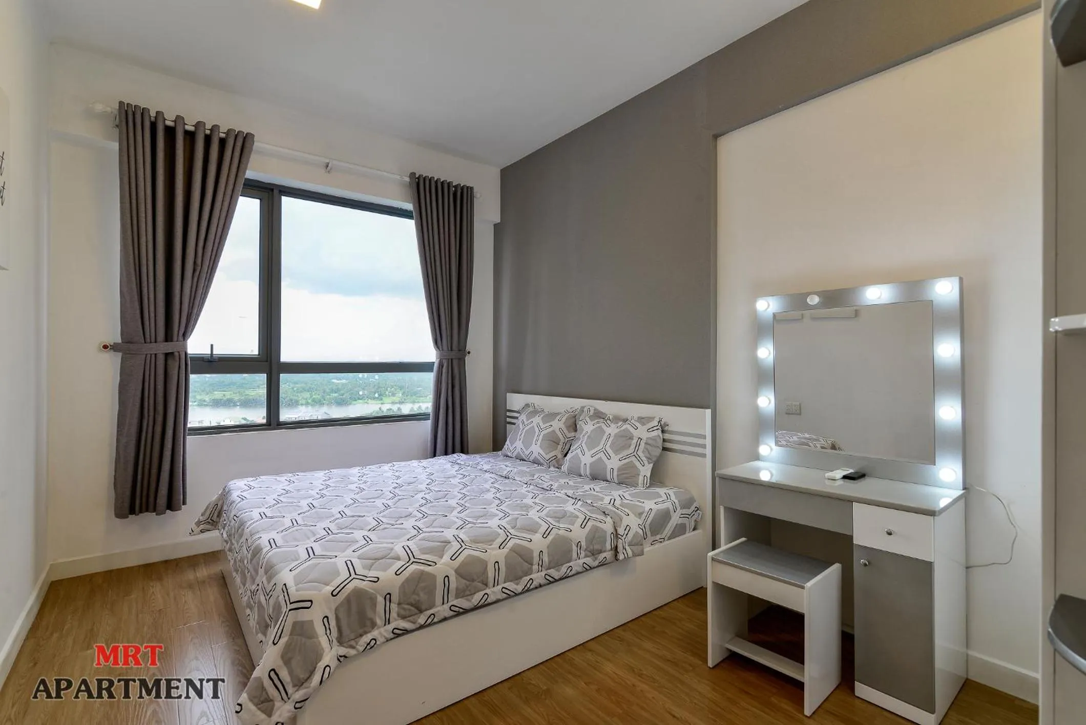 Bed in MRT Apartment In Masteri Thao Dien