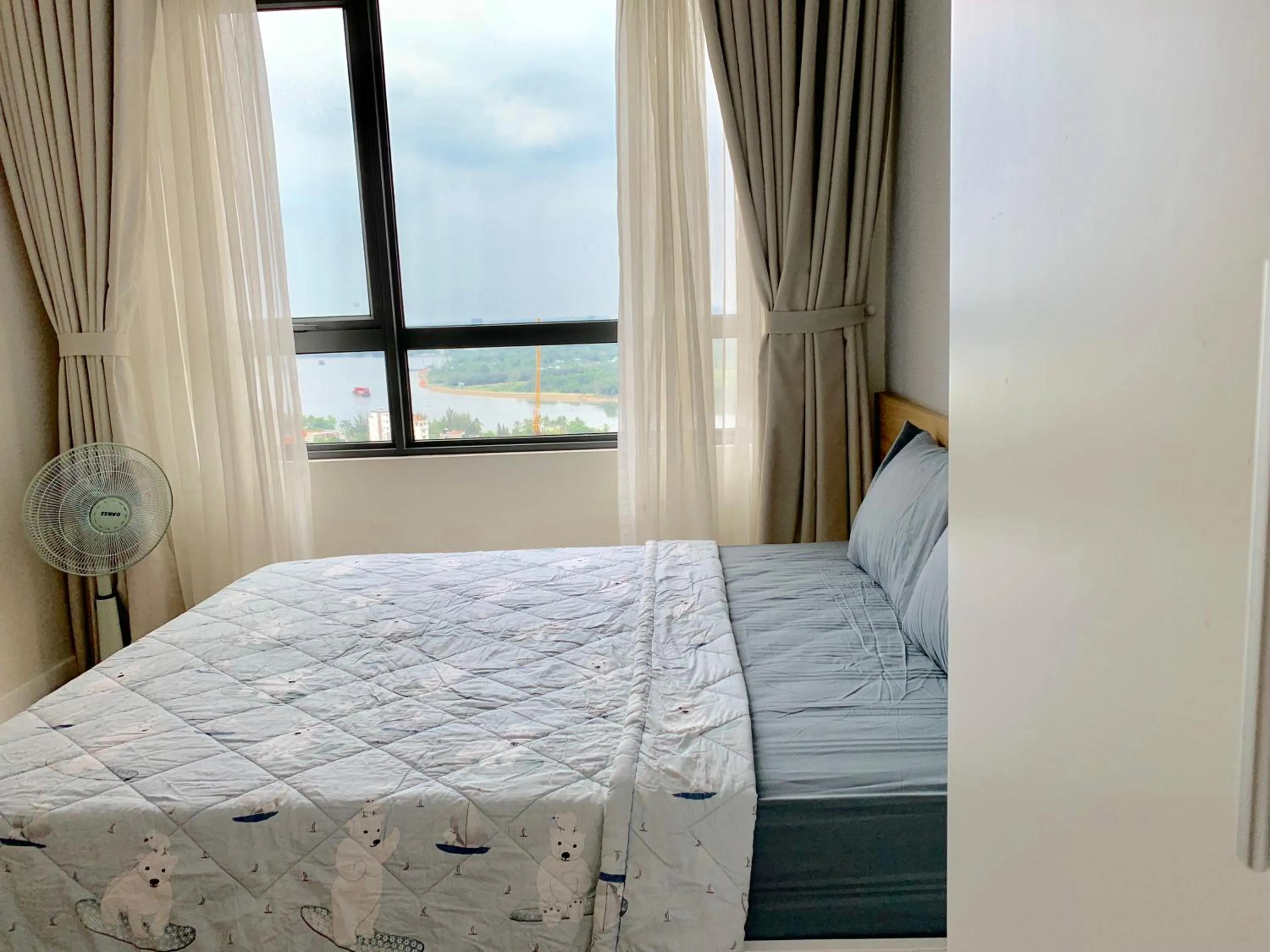 Bed in MRT Apartment In Masteri Thao Dien