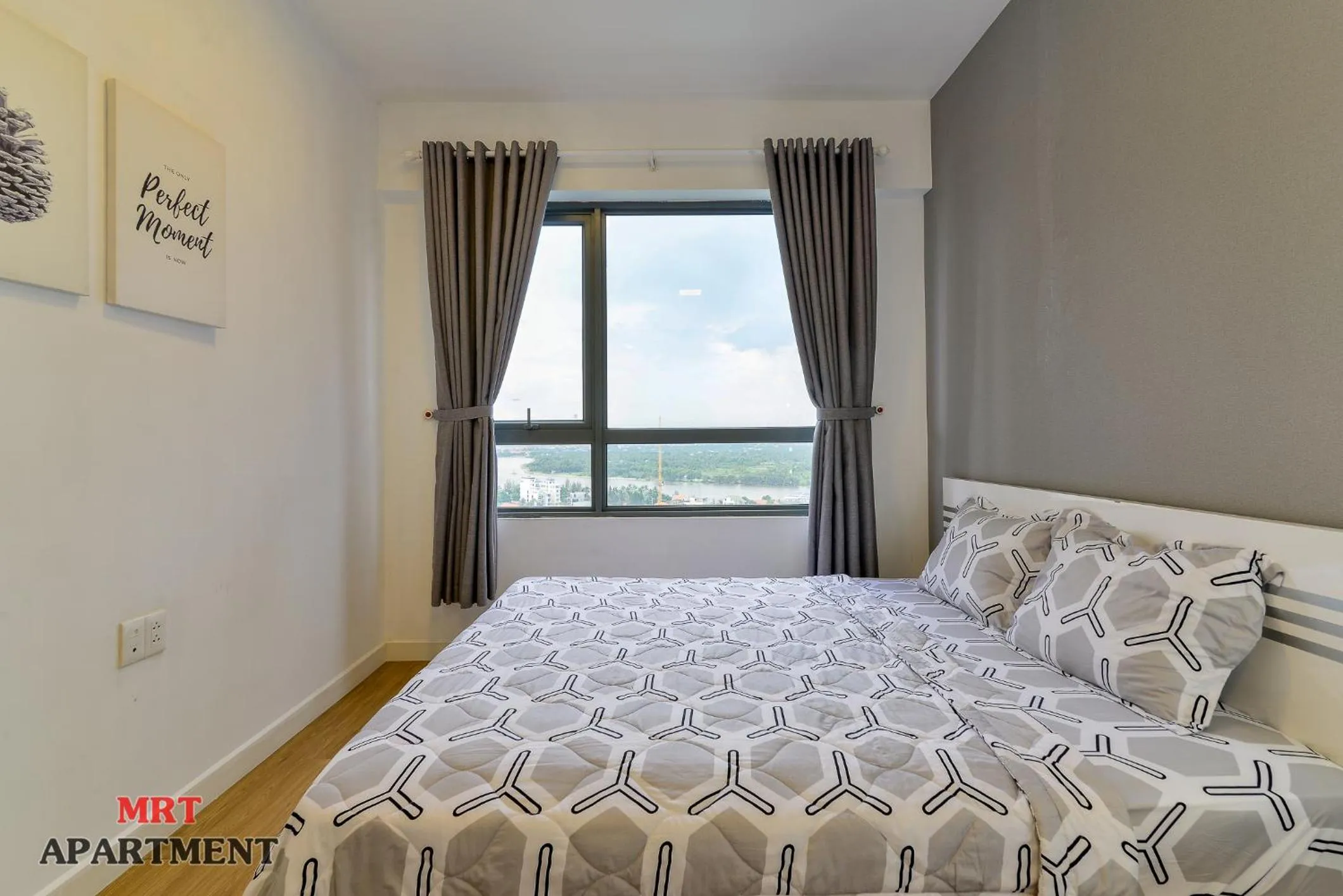 Bed in MRT Apartment In Masteri Thao Dien