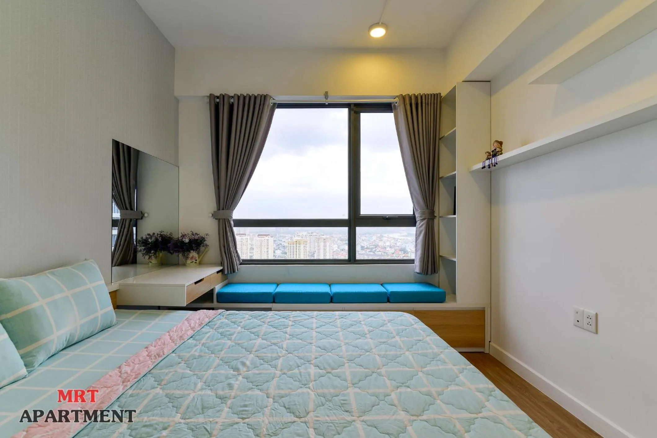 Bed in MRT Apartment In Masteri Thao Dien