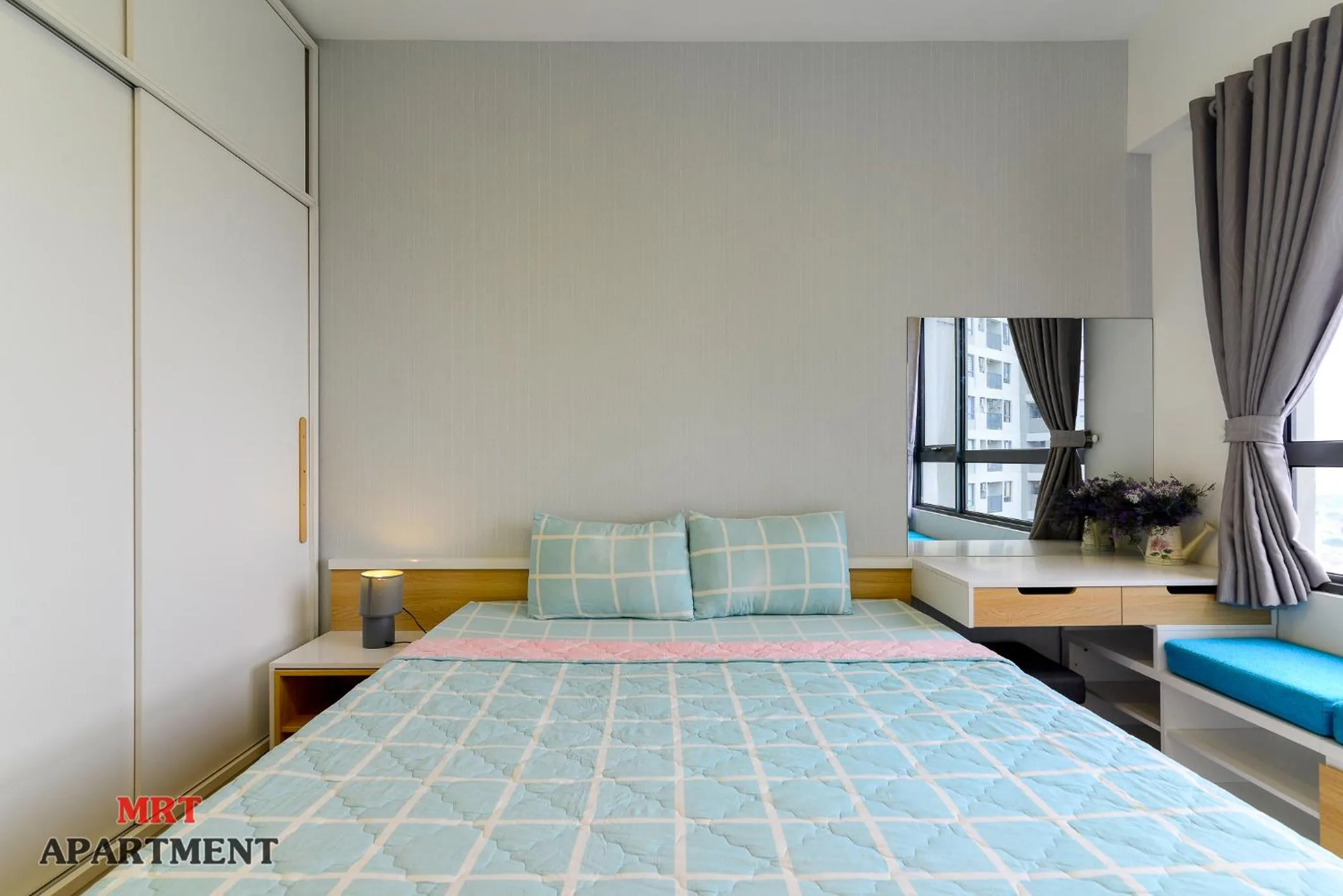 Bed in MRT Apartment In Masteri Thao Dien