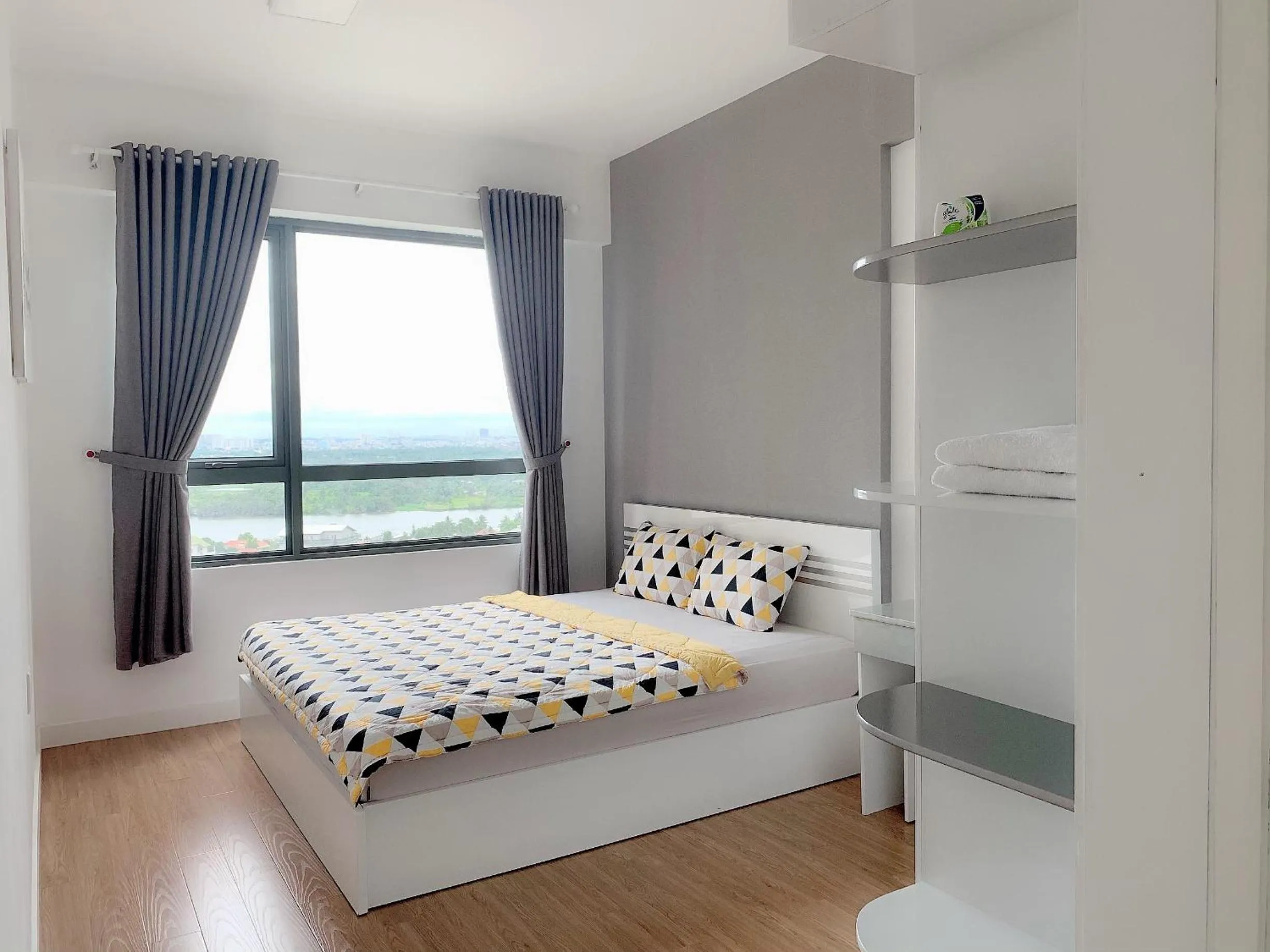 Bed in MRT Apartment In Masteri Thao Dien