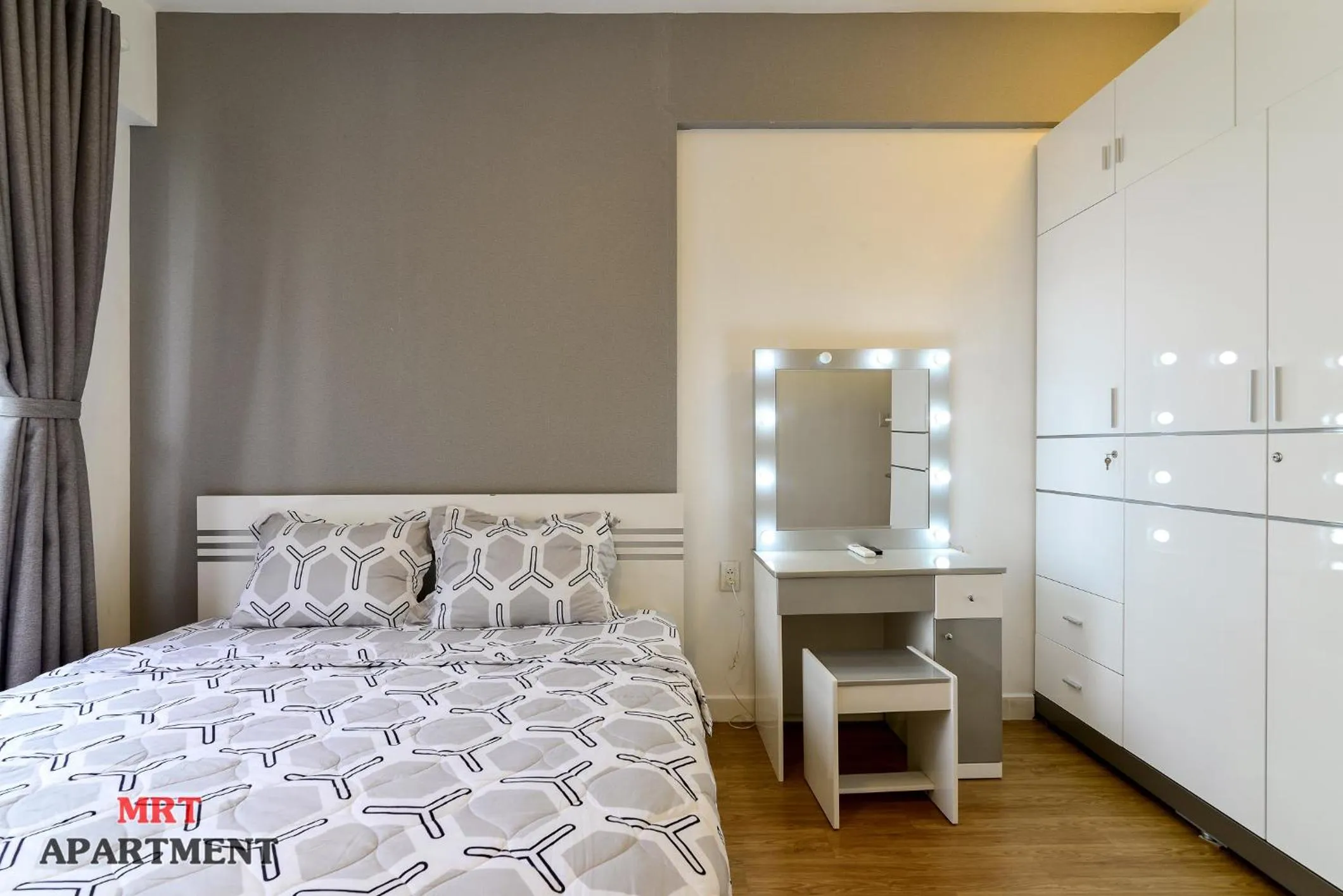 Bed in MRT Apartment In Masteri Thao Dien