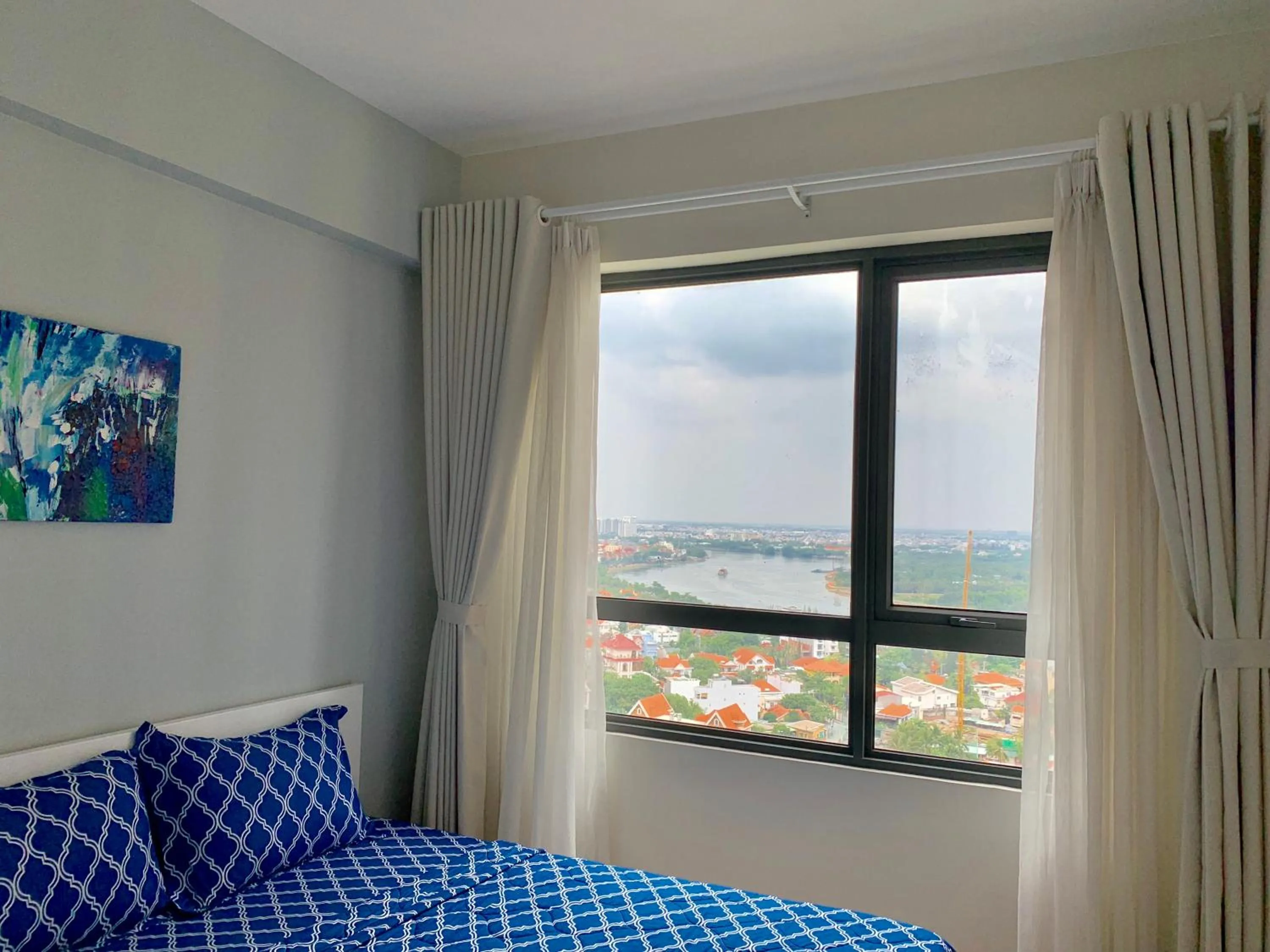 Bed in MRT Apartment In Masteri Thao Dien