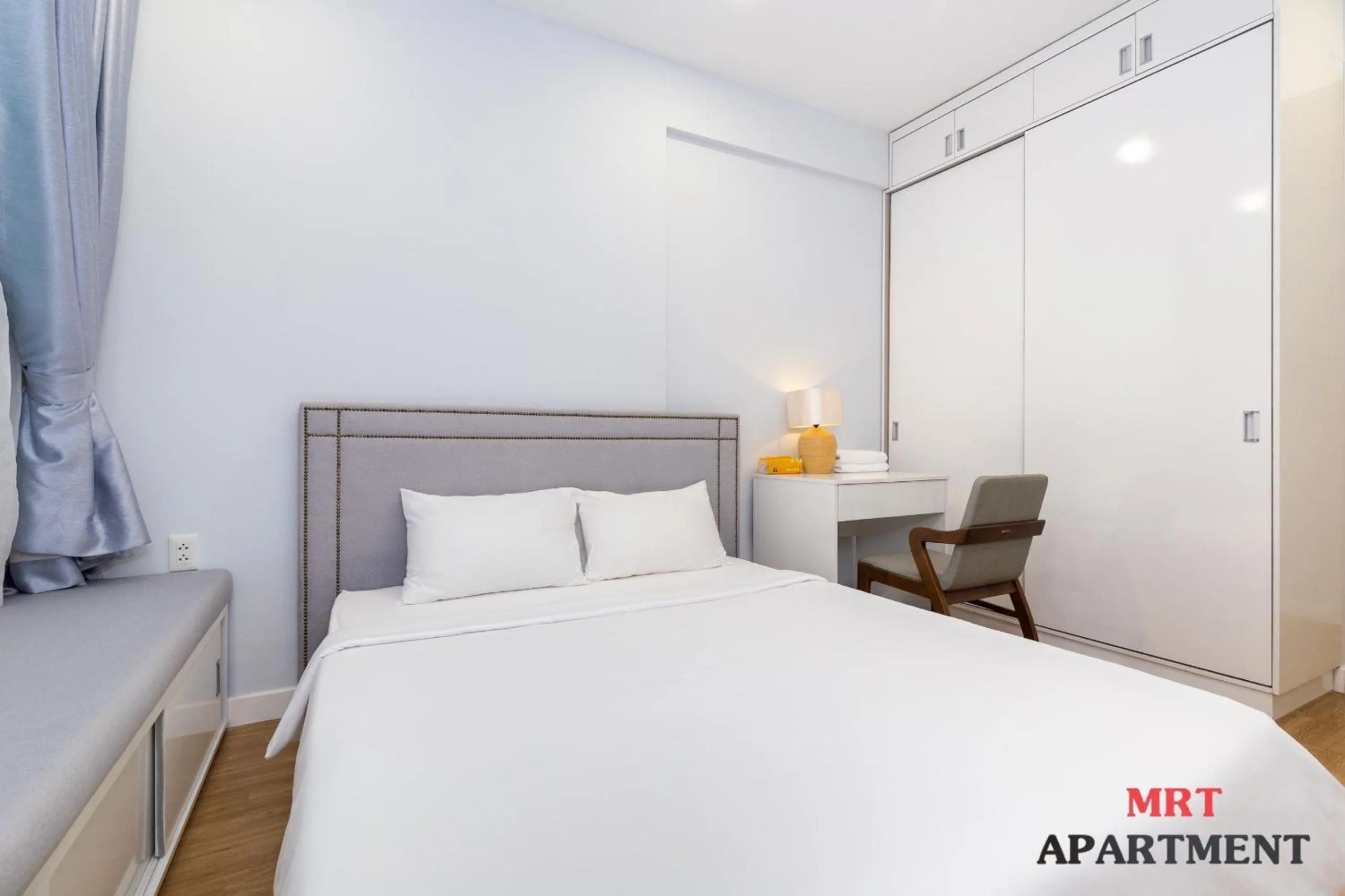 Bed in MRT Apartment In Masteri Thao Dien