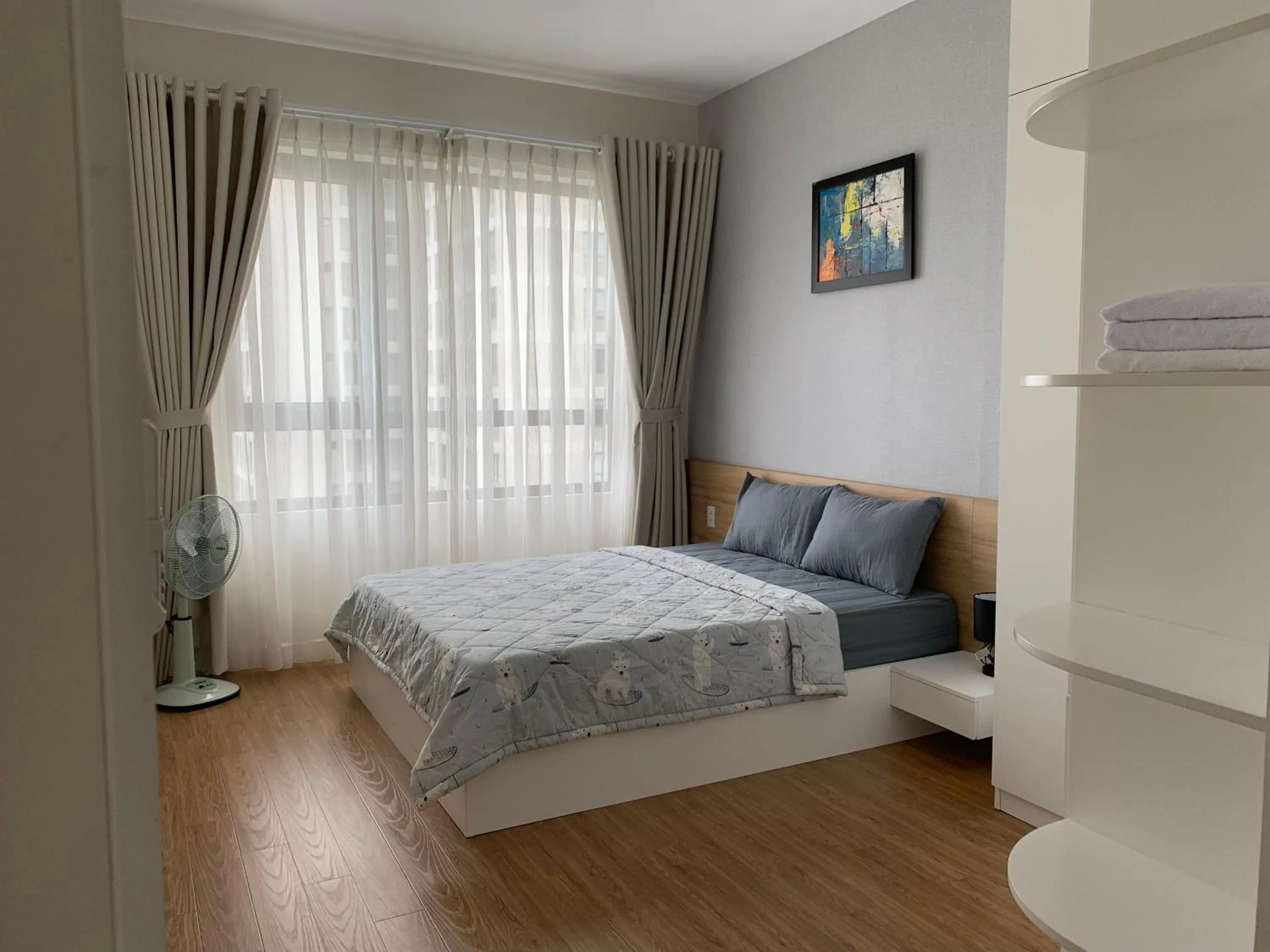 Bed in MRT Apartment In Masteri Thao Dien