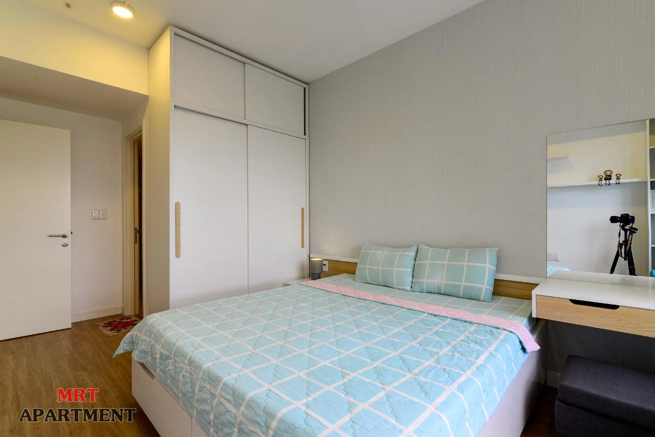 Bed in MRT Apartment In Masteri Thao Dien