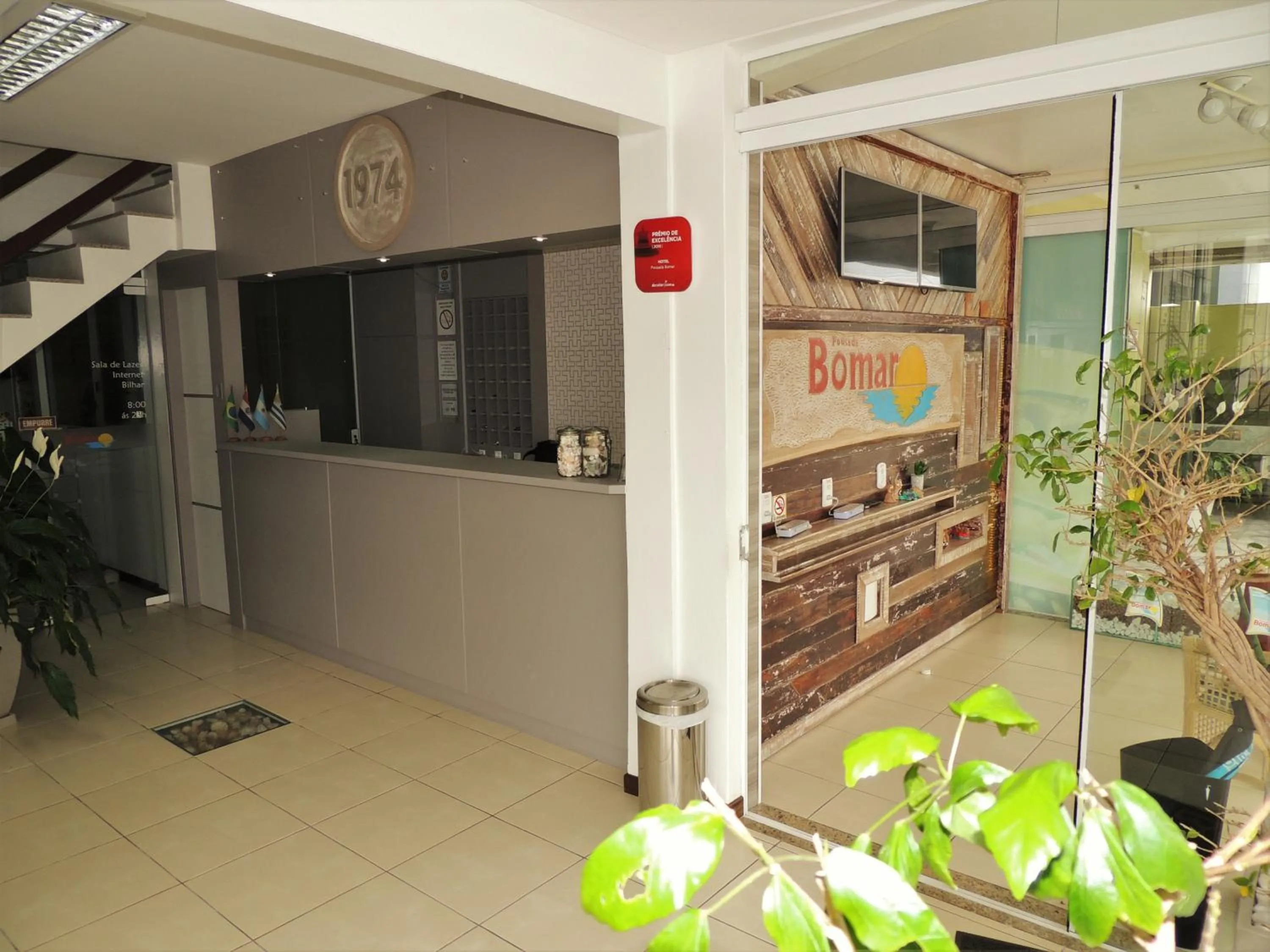 Communal lounge/ TV room in Pousada Bomar Bombinhas