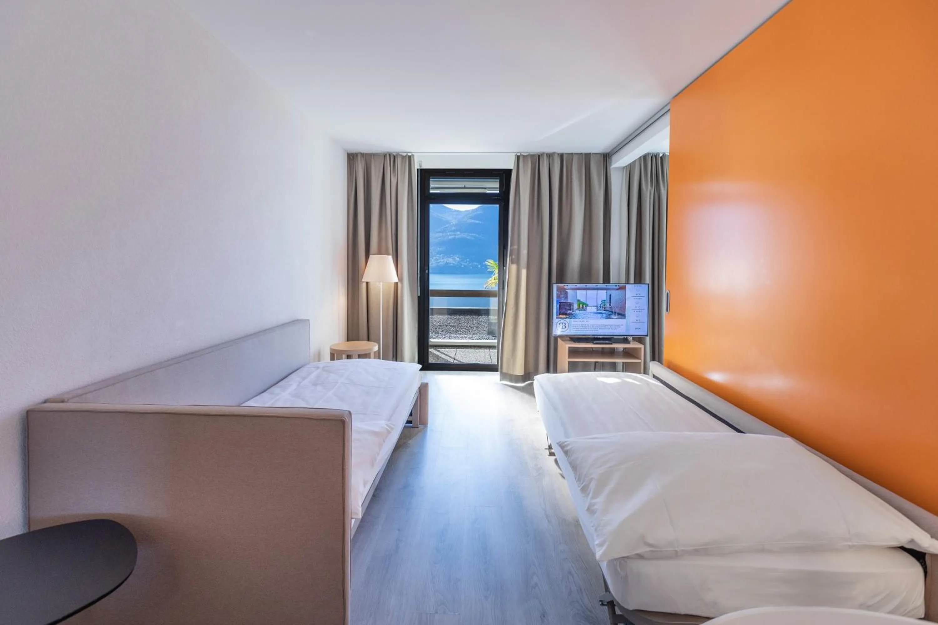 View (from property/room), Bed in Parkhotel Brenscino Brissago