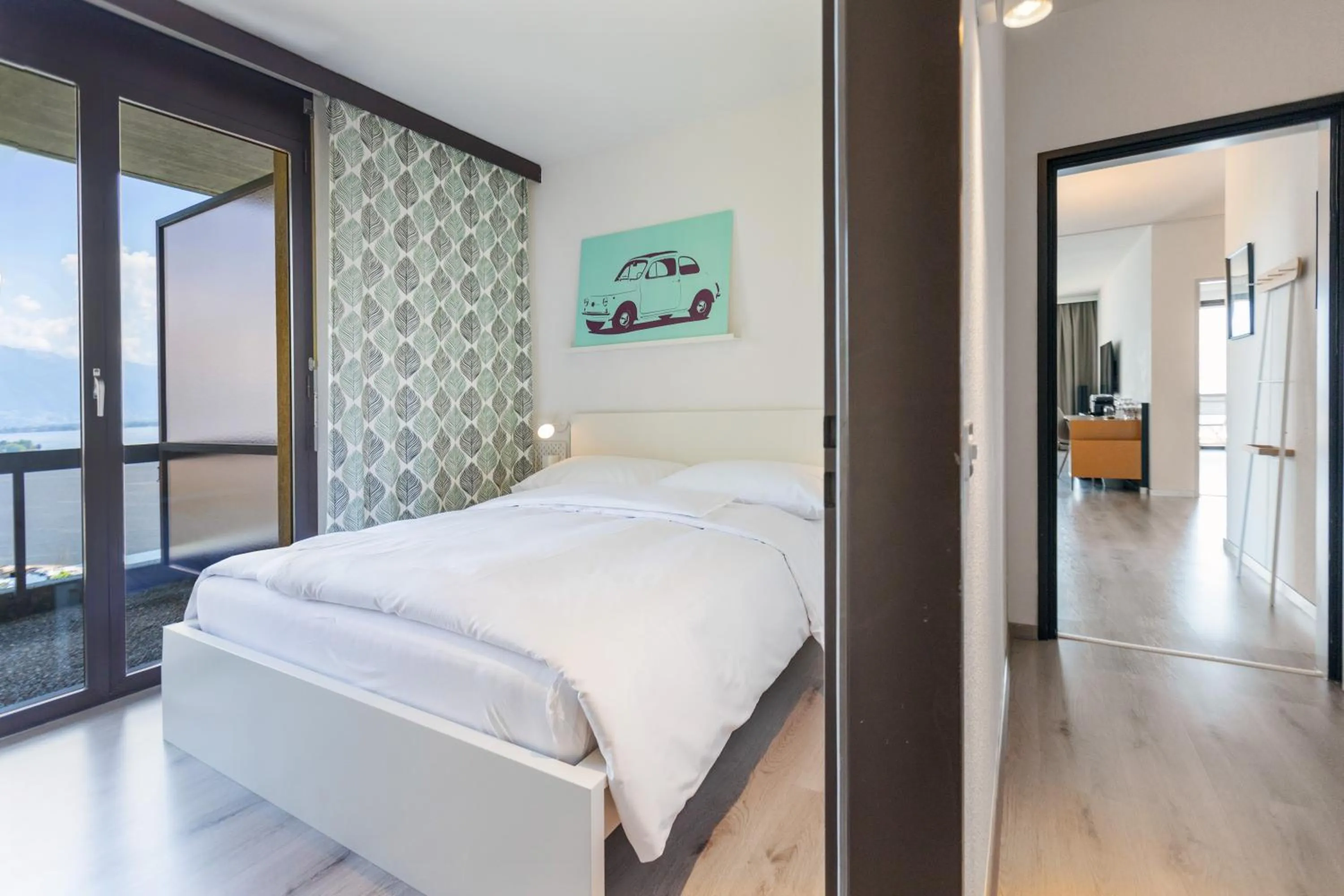 Bedroom, Bed in Parkhotel Brenscino Brissago