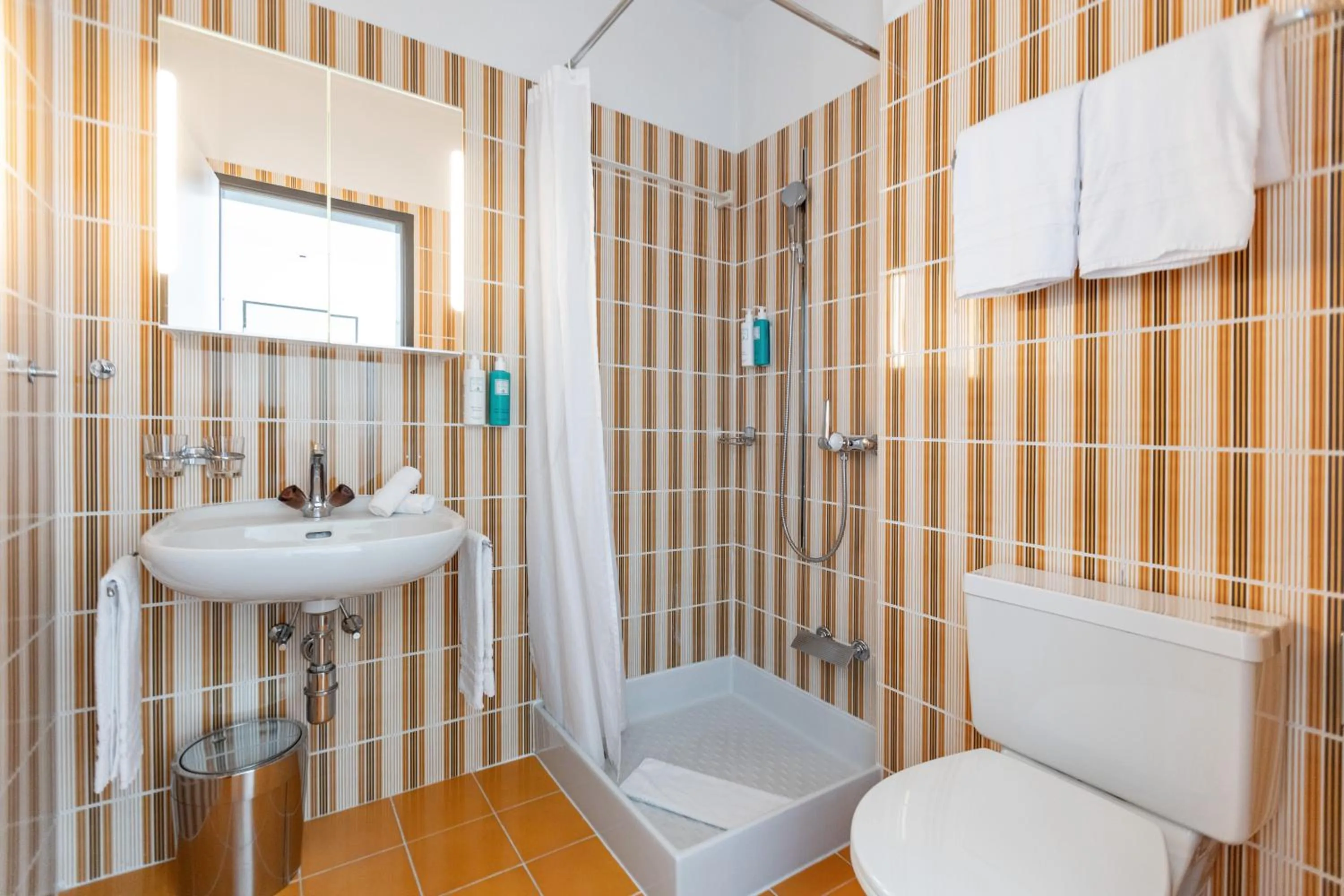 Bathroom in Parkhotel Brenscino Brissago