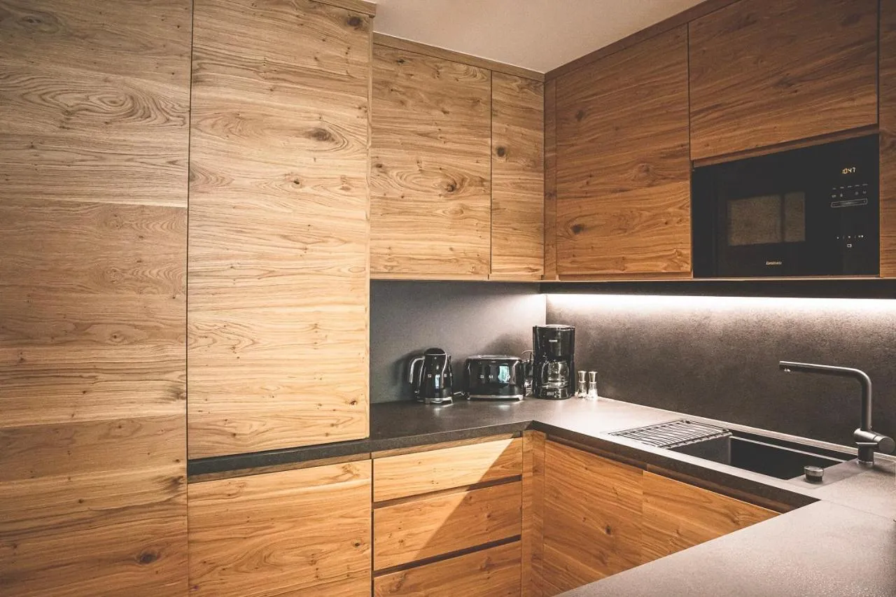 Kitchen or kitchenette in Hotel & Appartements Alpenresidenz Viktoria