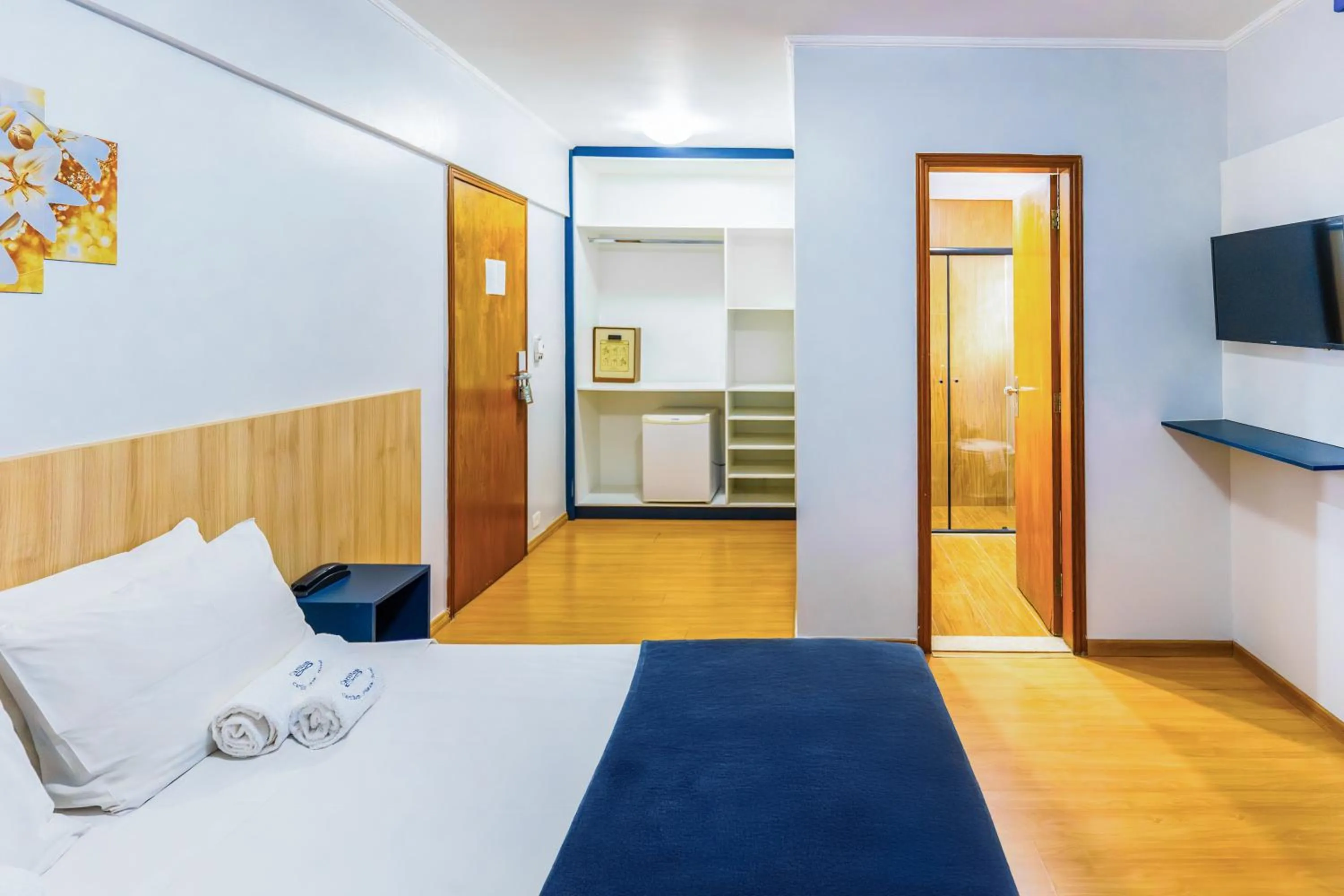 Bed in Carillon Plaza Hotel