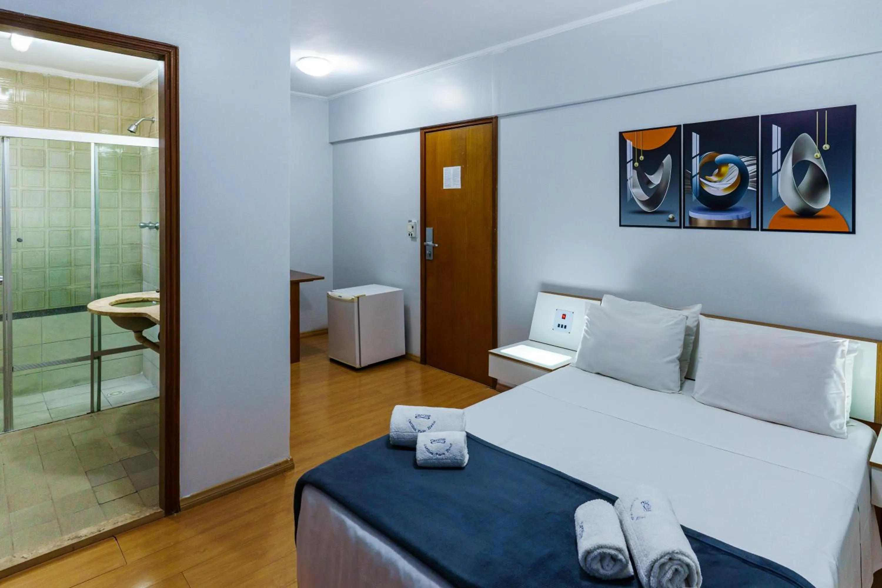 Bed in Carillon Plaza Hotel