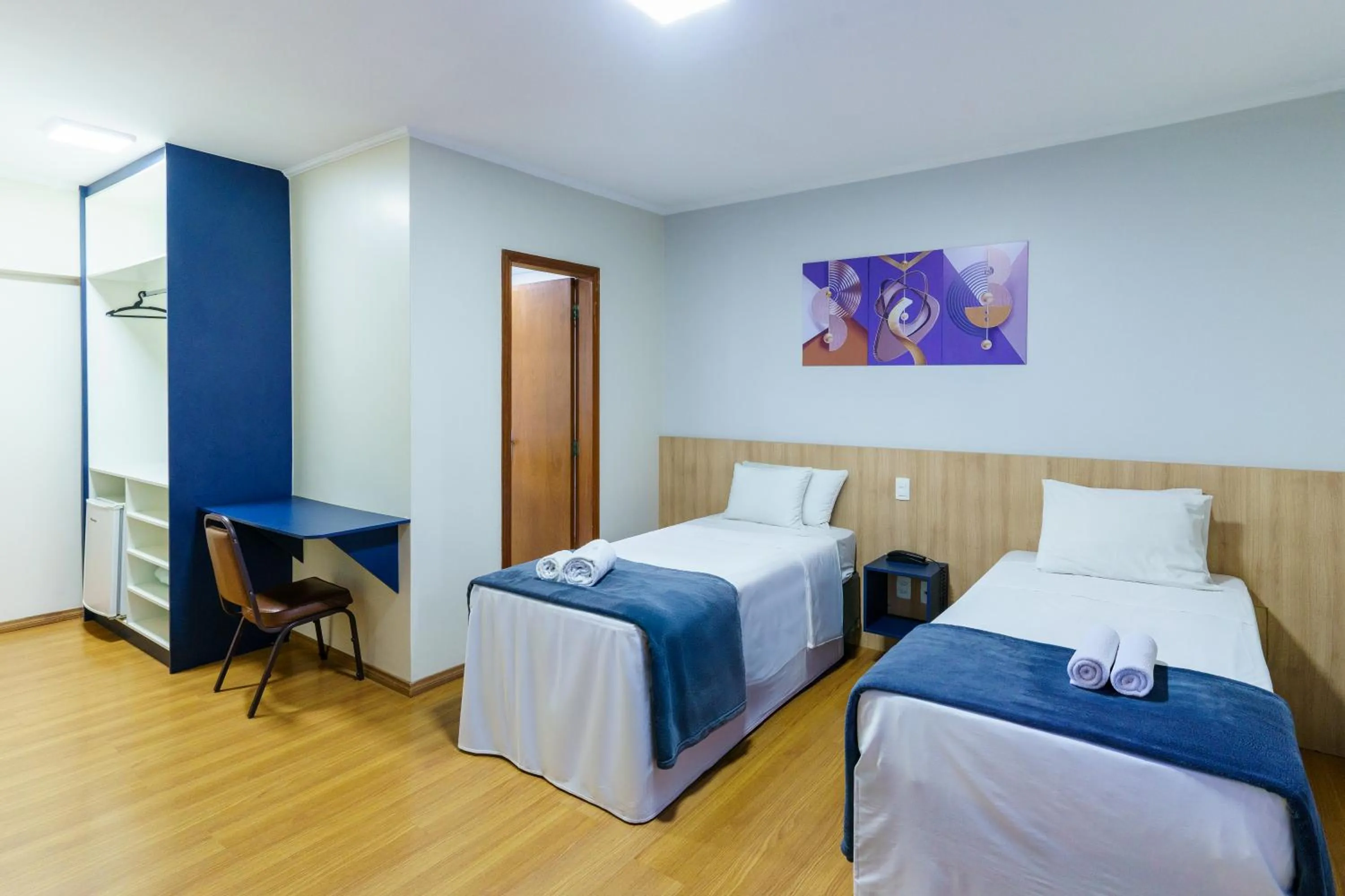 Bed in Carillon Plaza Hotel