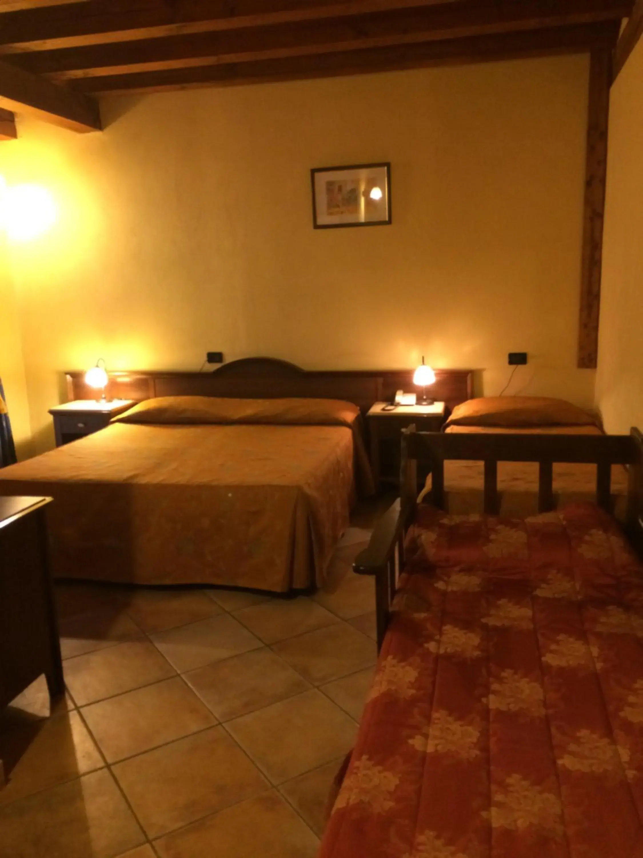 Quadruple Room in Hotel Cà Fiore Quadruple Room in Hotel Cà Fiore