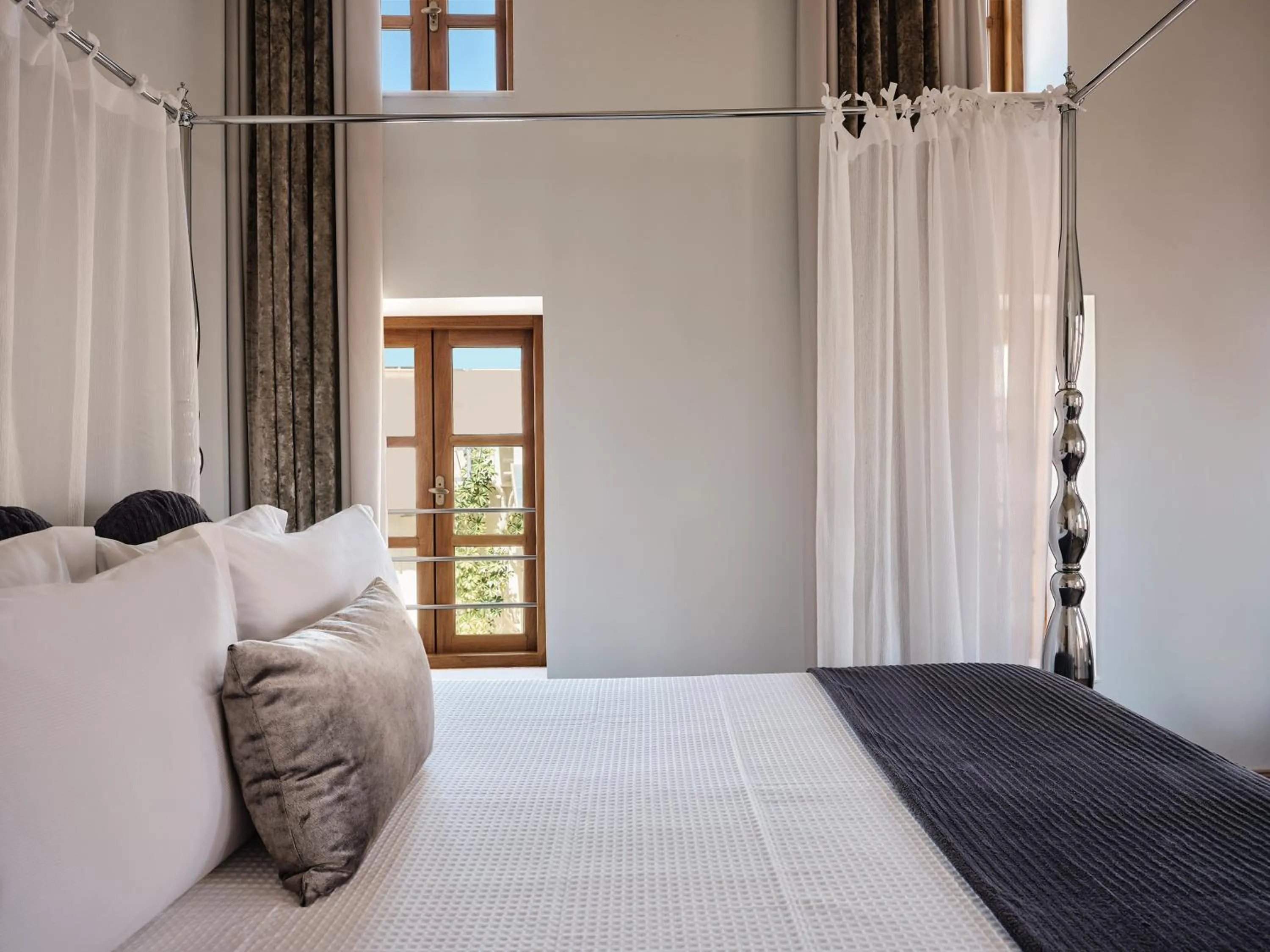 Bed in Casa Delfino Hotel & Spa