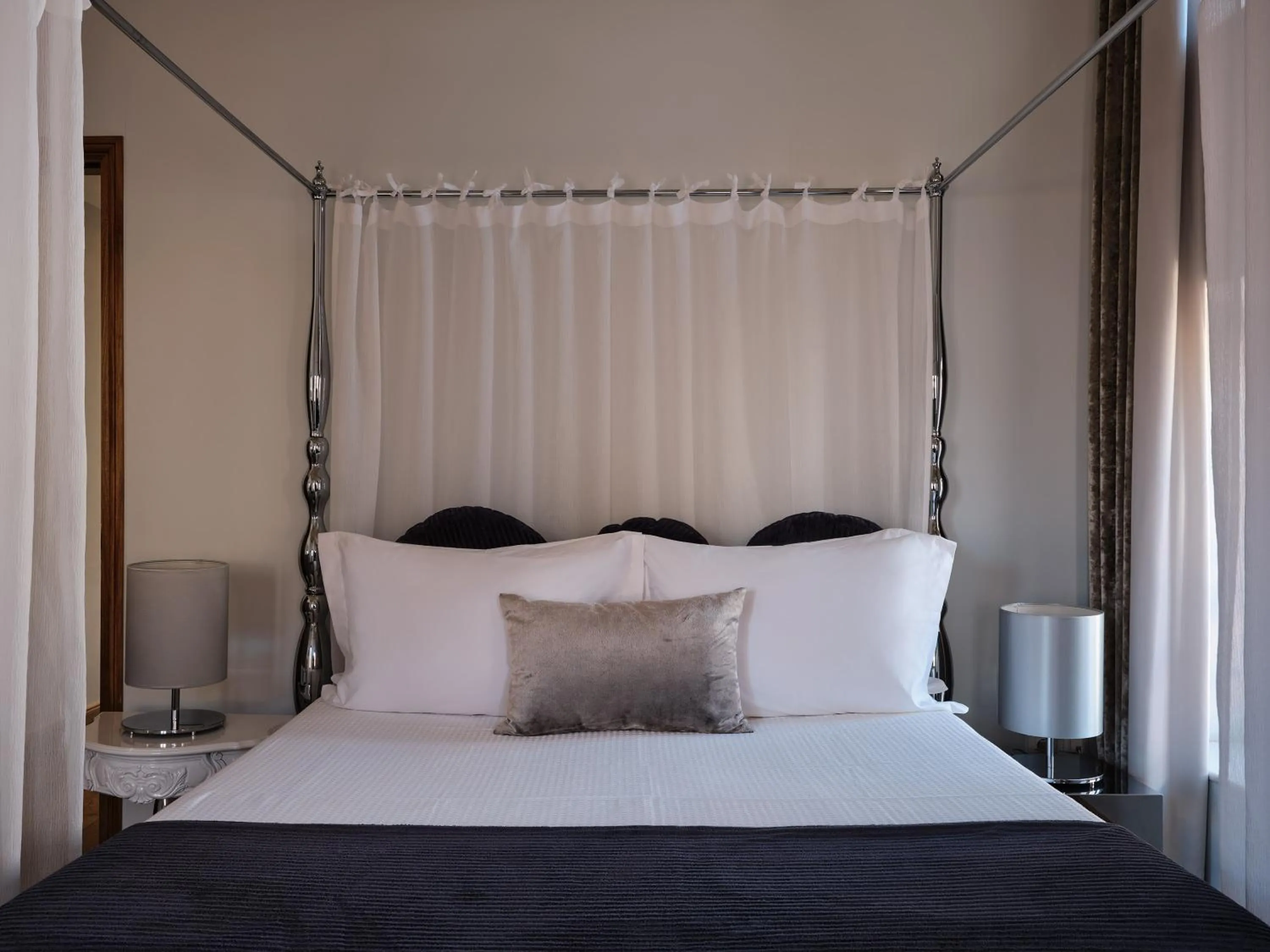 Bed in Casa Delfino Hotel & Spa