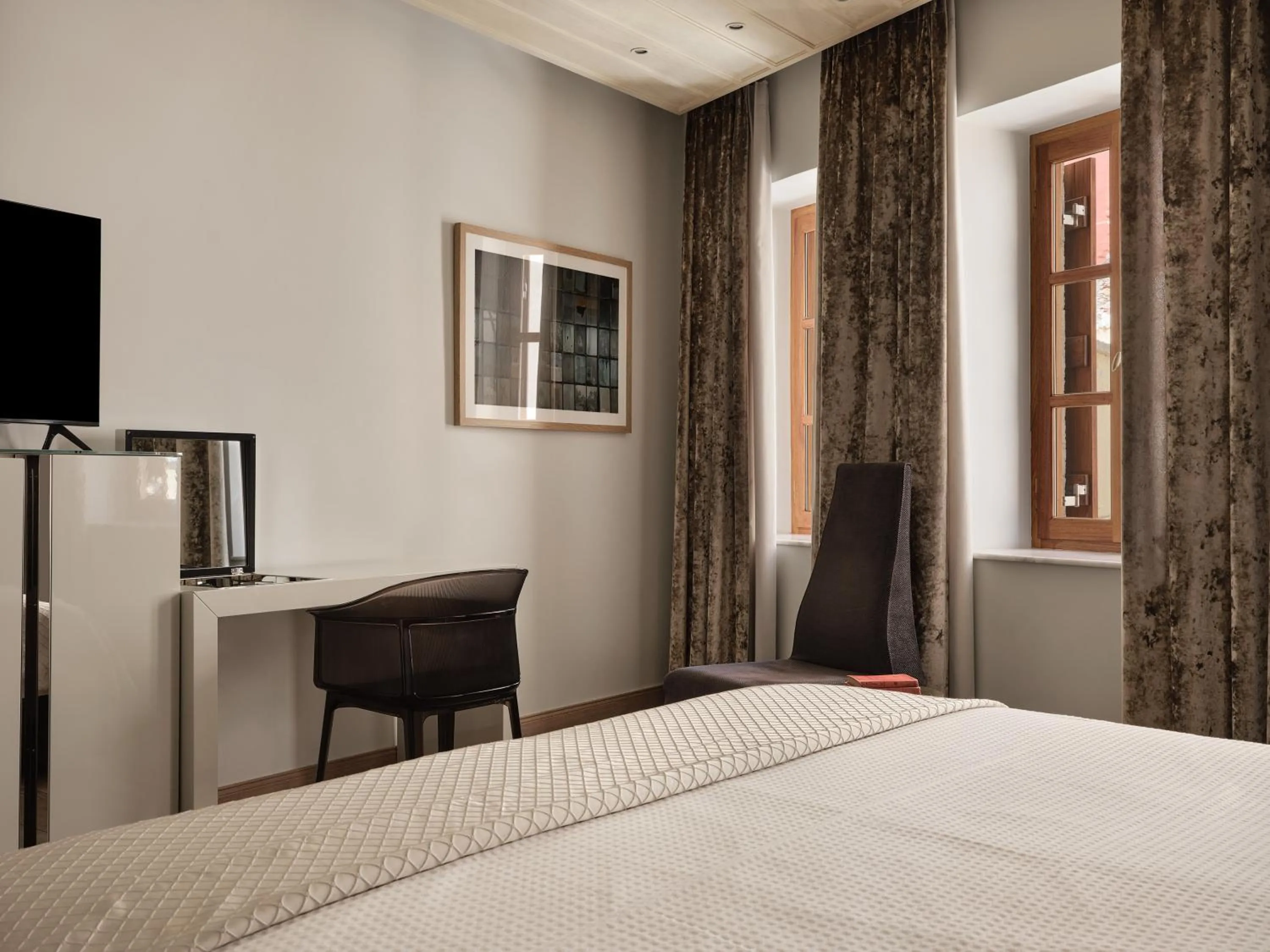 Bed in Casa Delfino Hotel & Spa