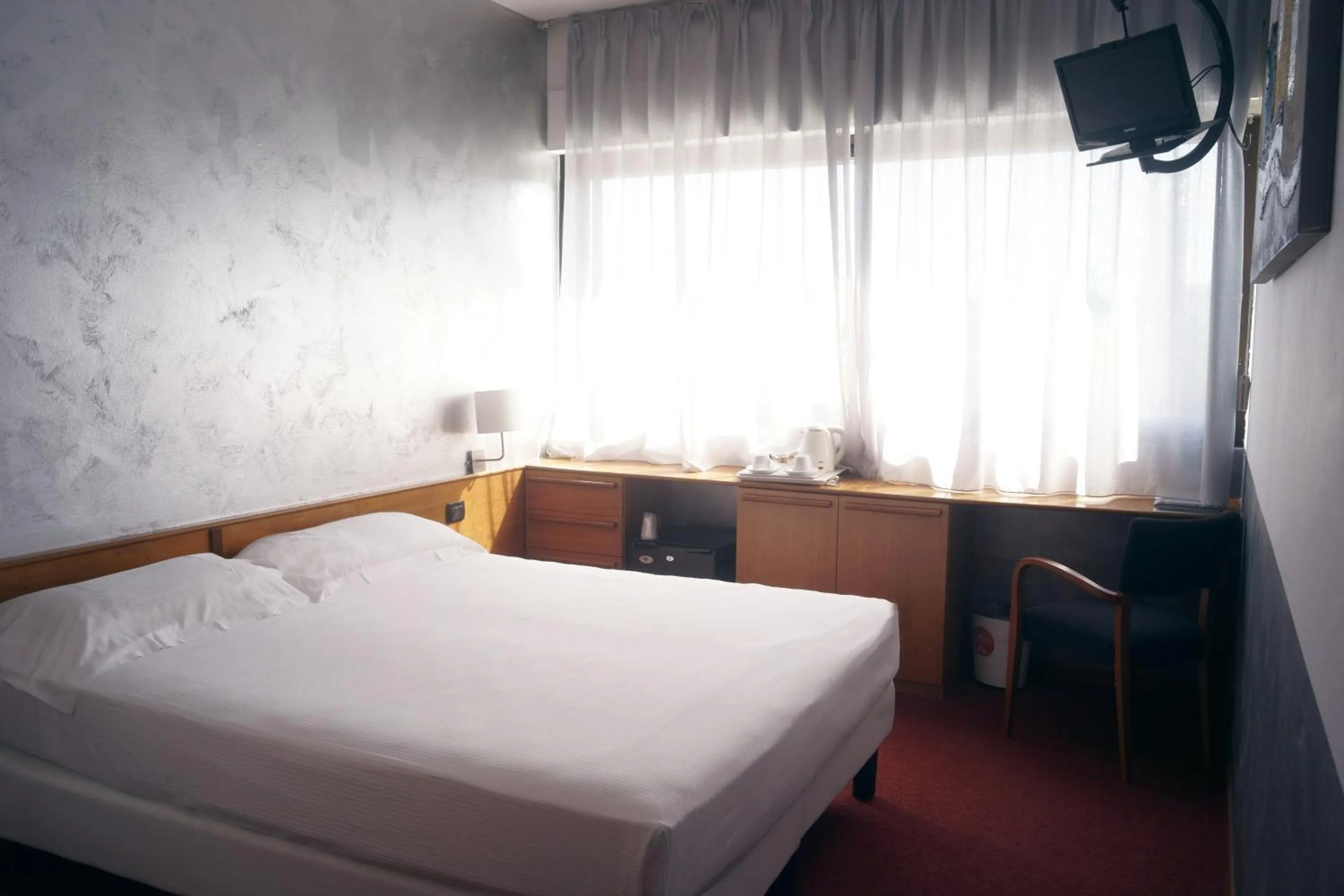 Bedroom, Bed in Hotel Valpolicella International