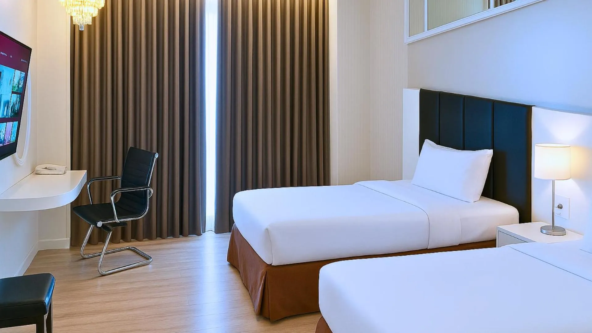 Bed in The Grantage Hotel & Sky Lounge