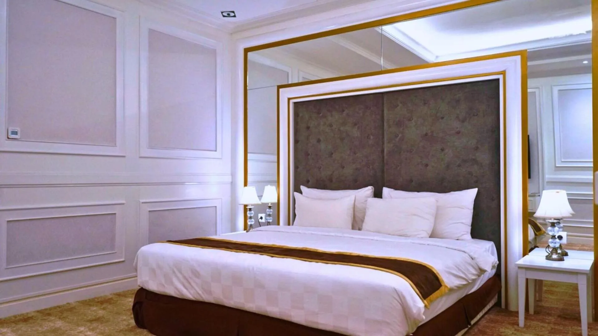 Bed in The Grantage Hotel & Sky Lounge