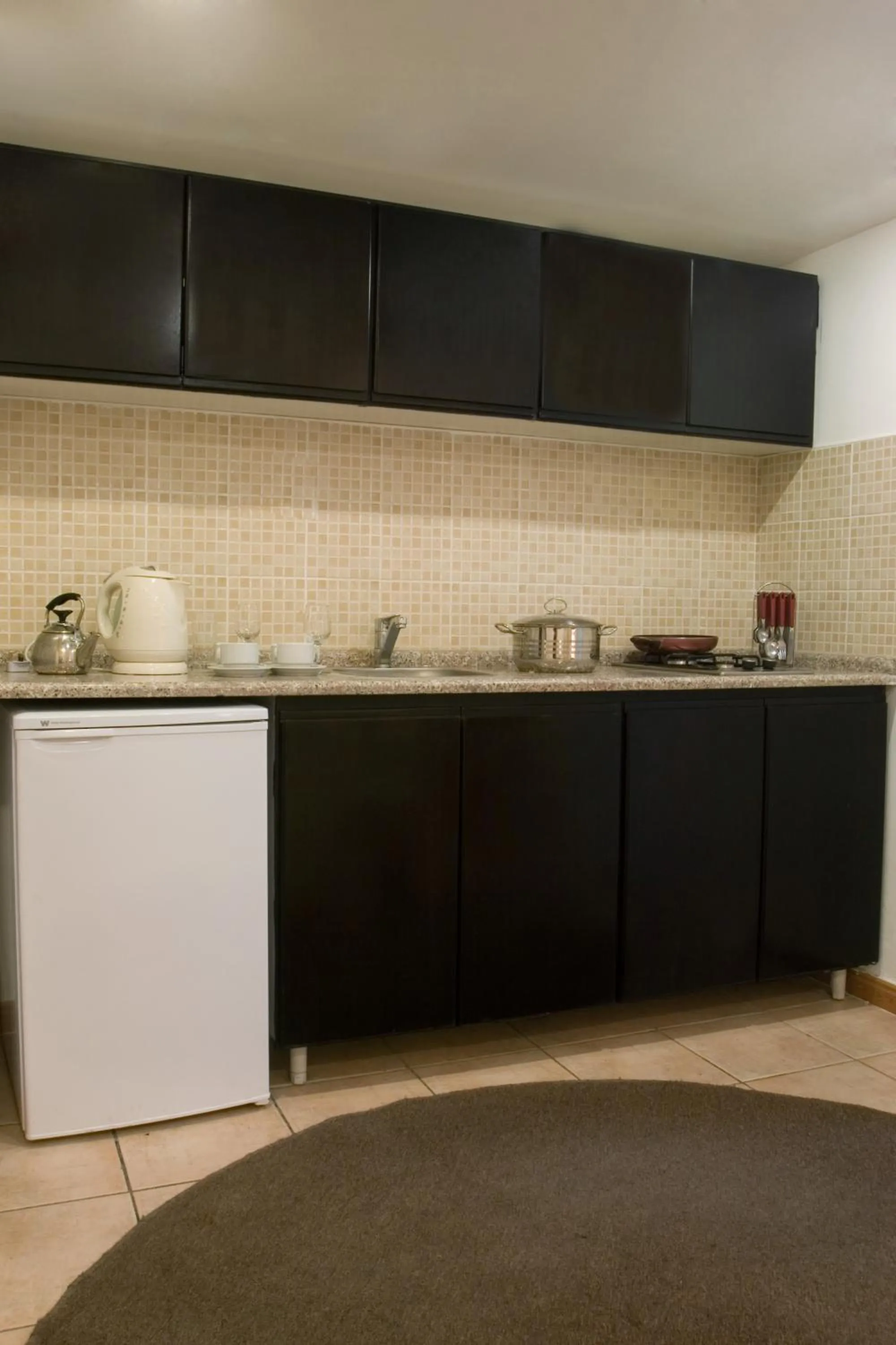 Kitchen or kitchenette in Barakat Hotel Apartments