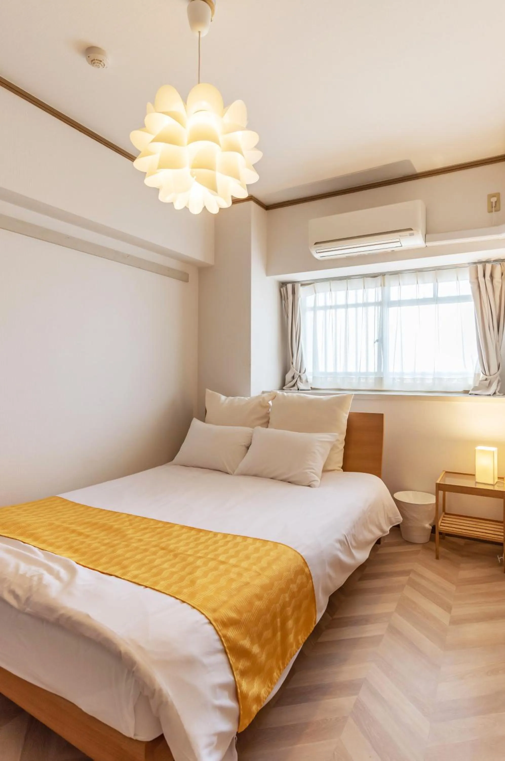 Bed in Universal Bay Condominium