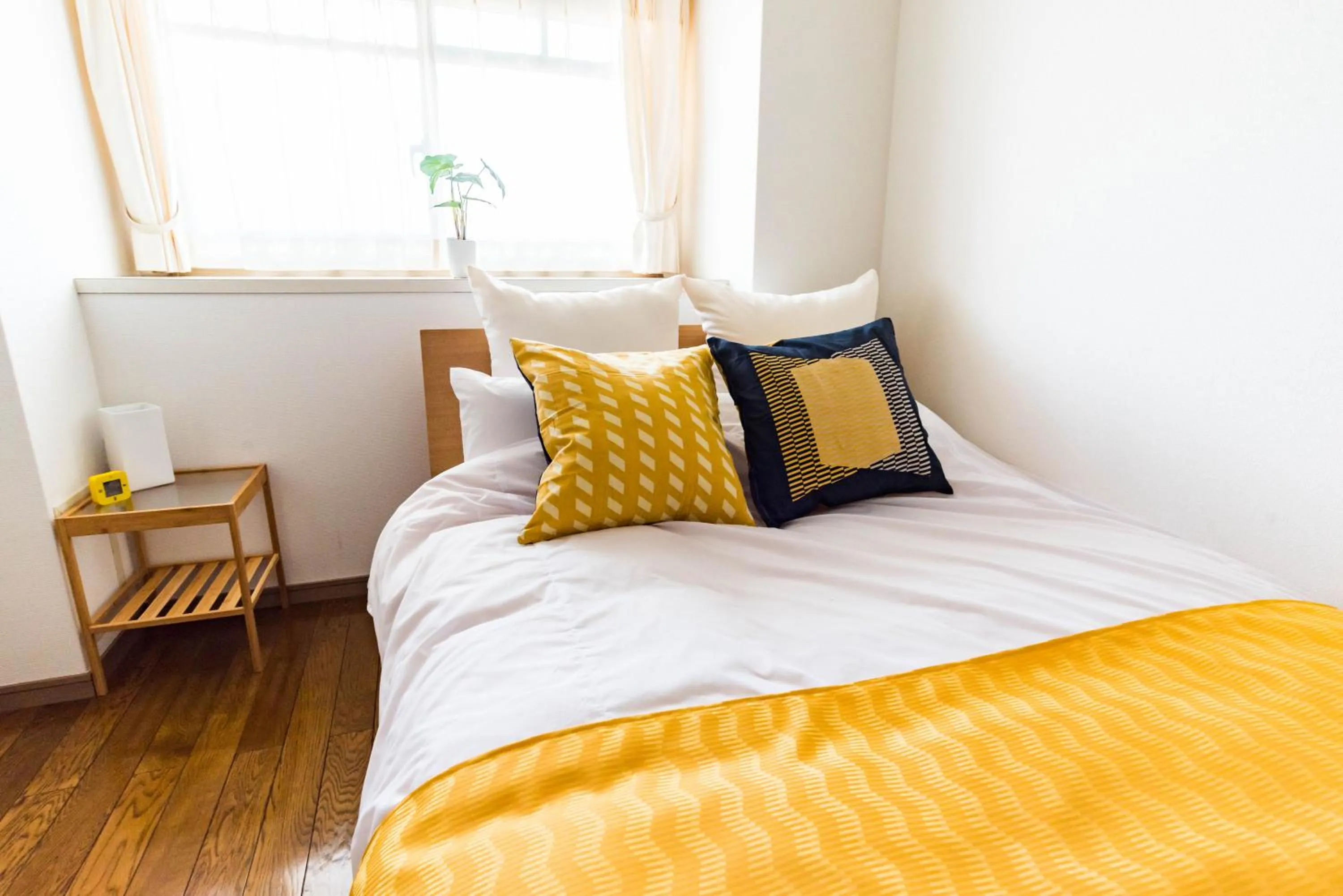 Bed in Universal Bay Condominium