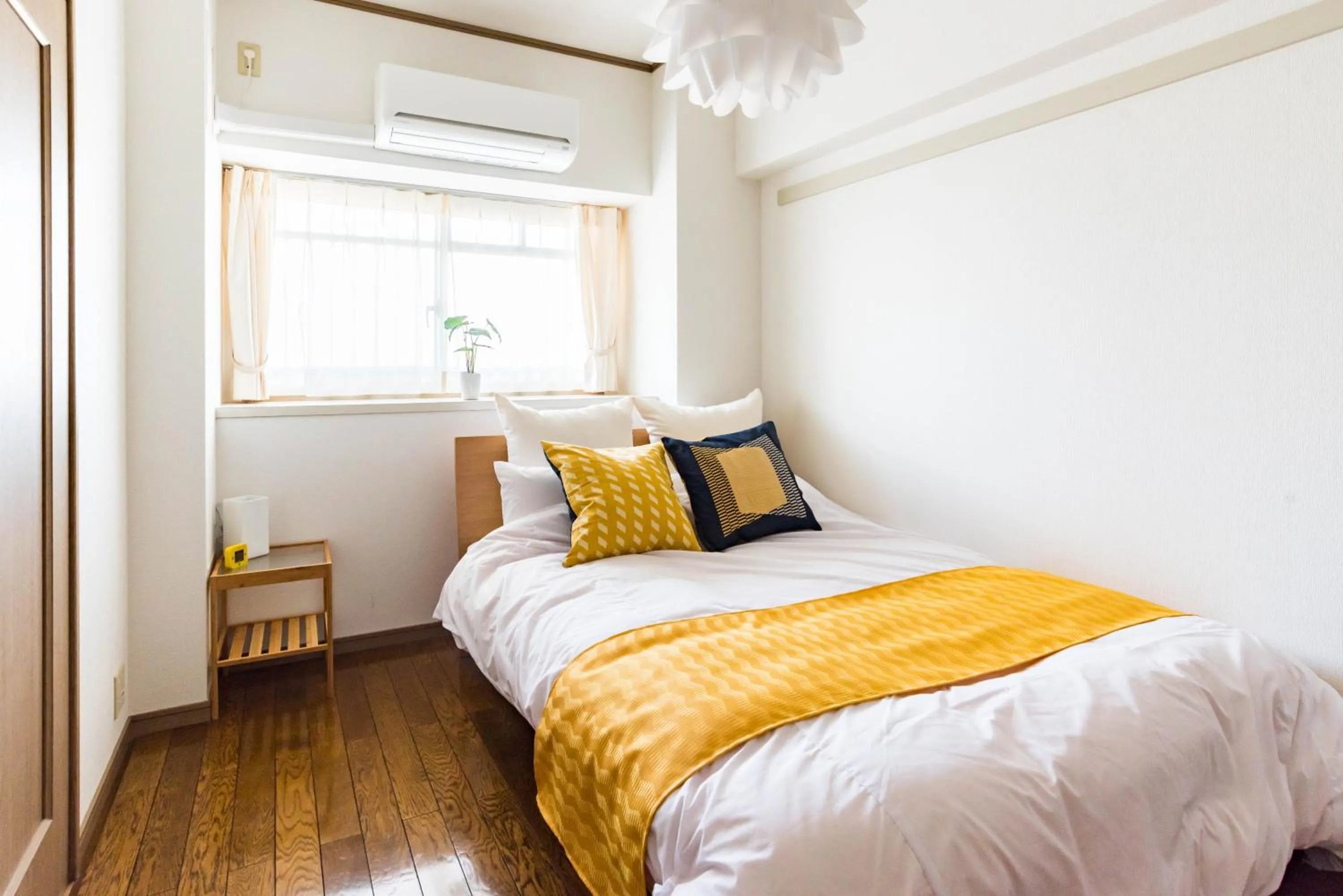 Bed in Universal Bay Condominium