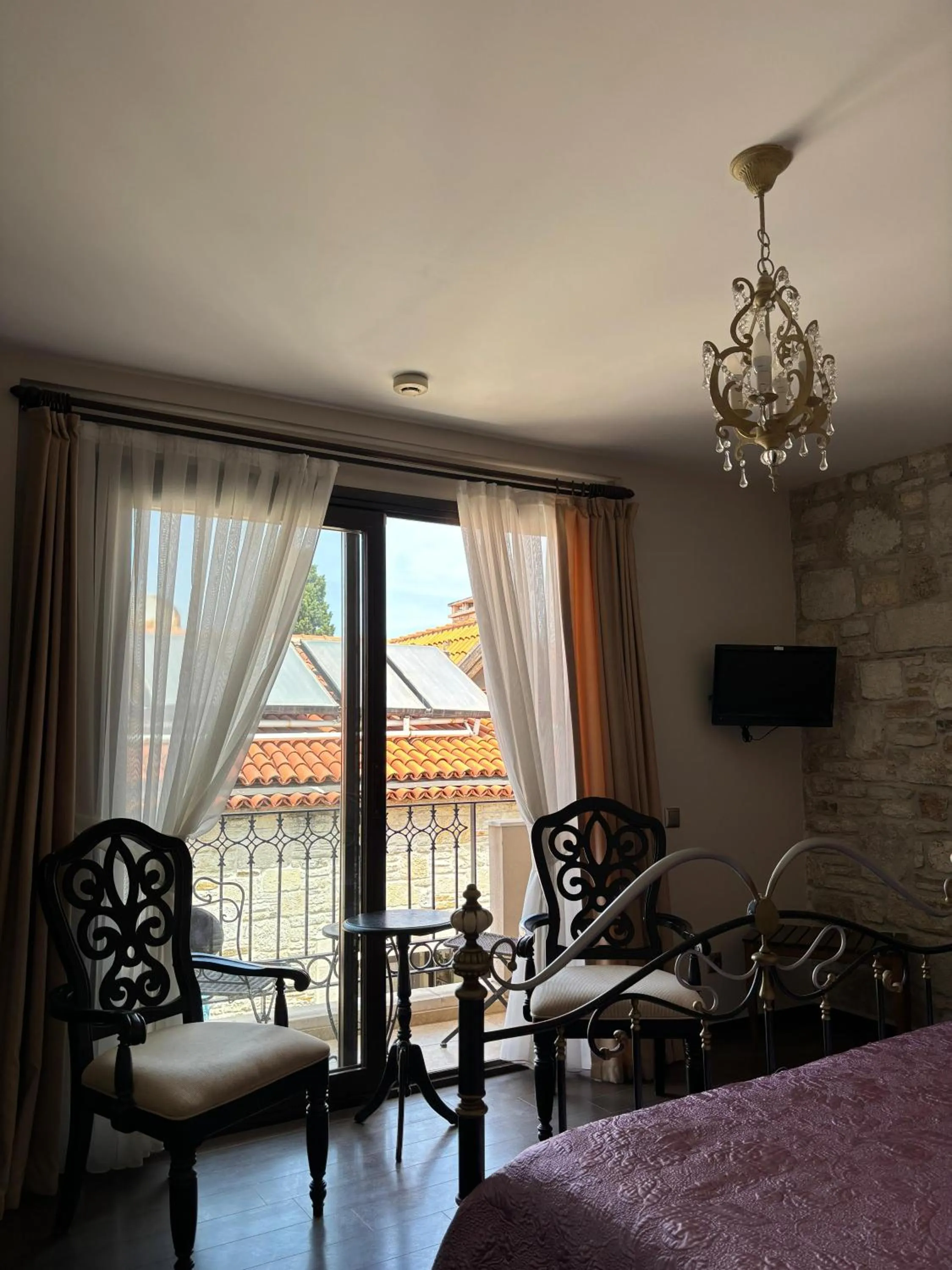 Bed in Griffon Hotel