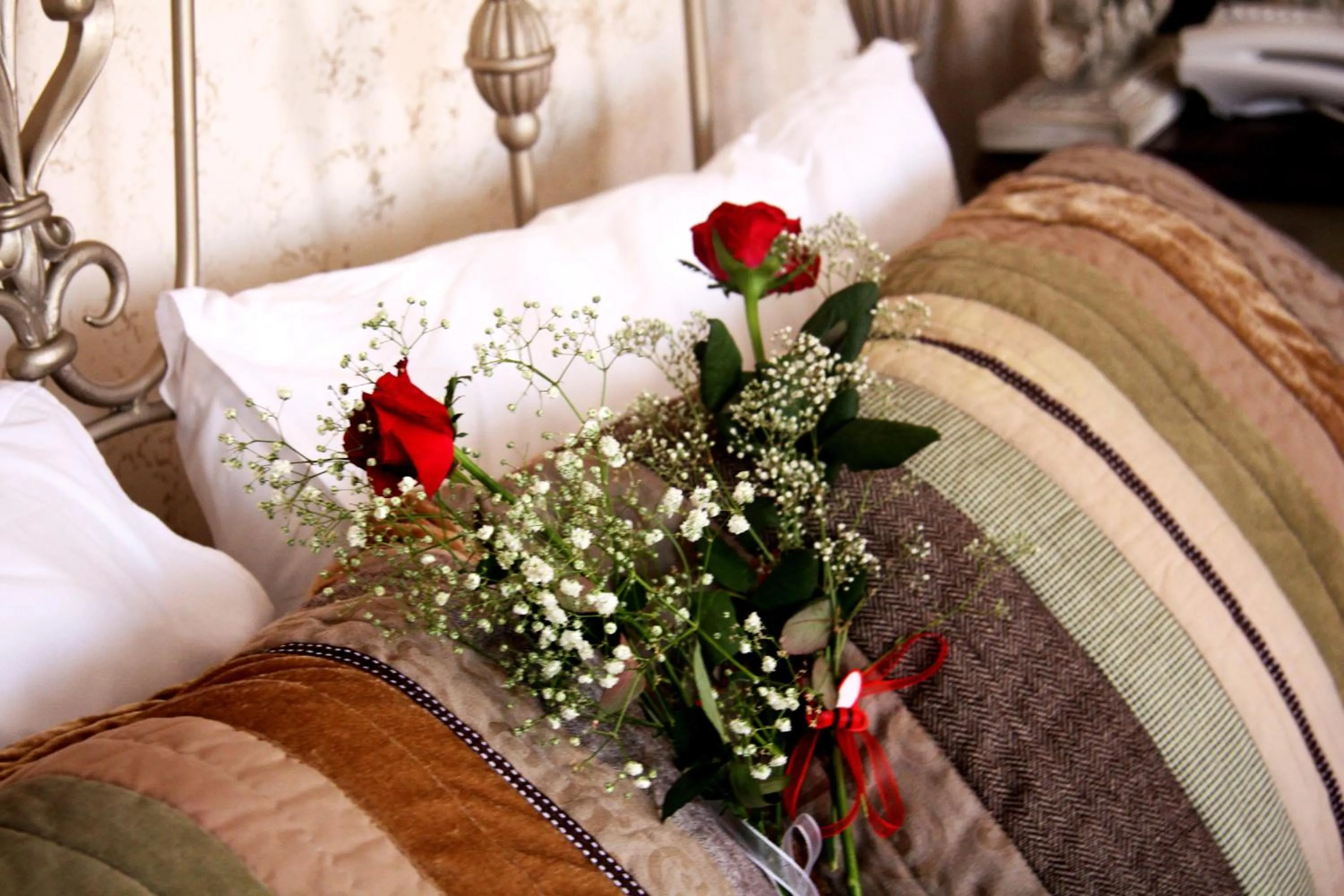 Bed in Griffon Hotel