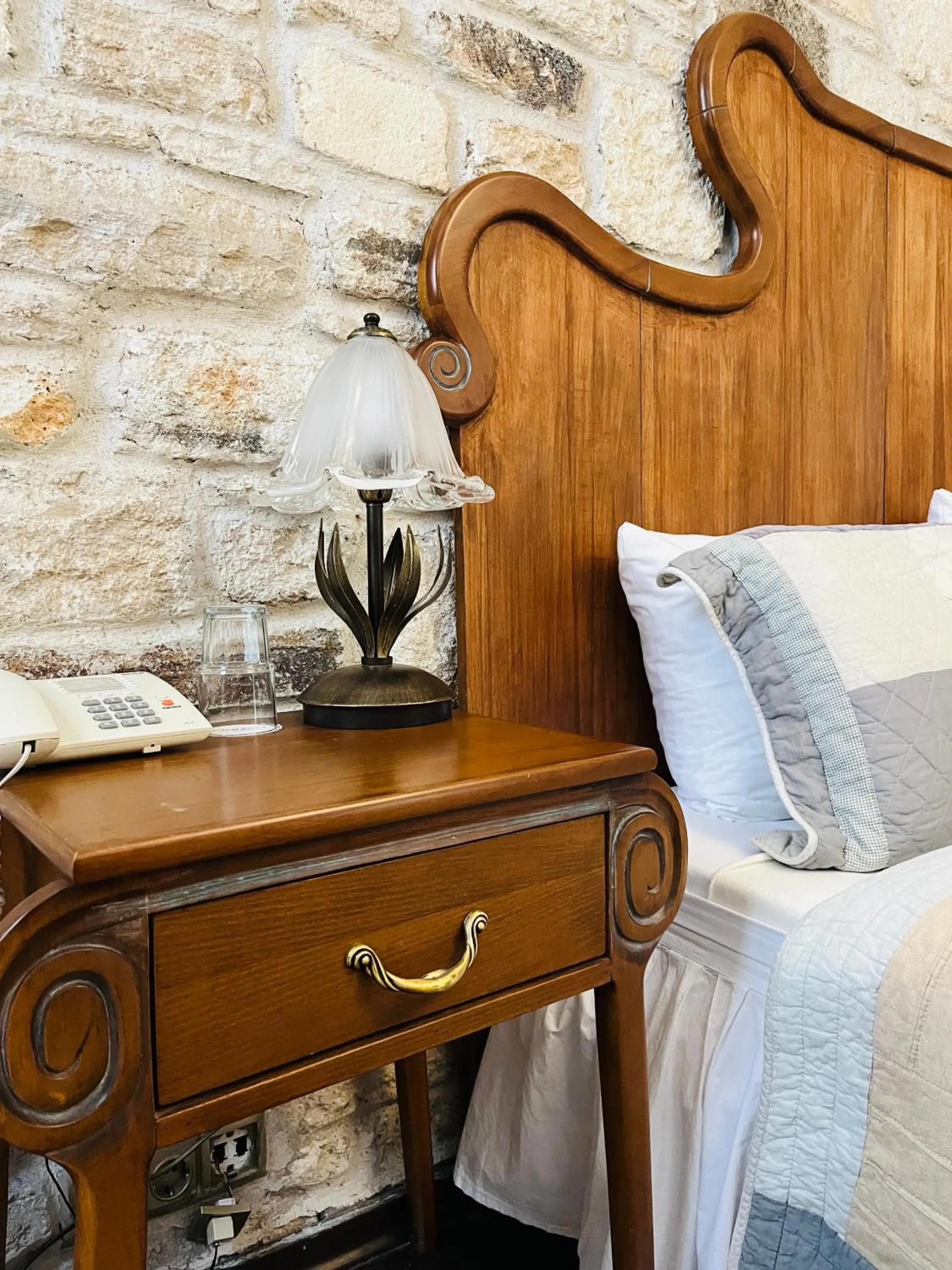 Bed in Griffon Hotel