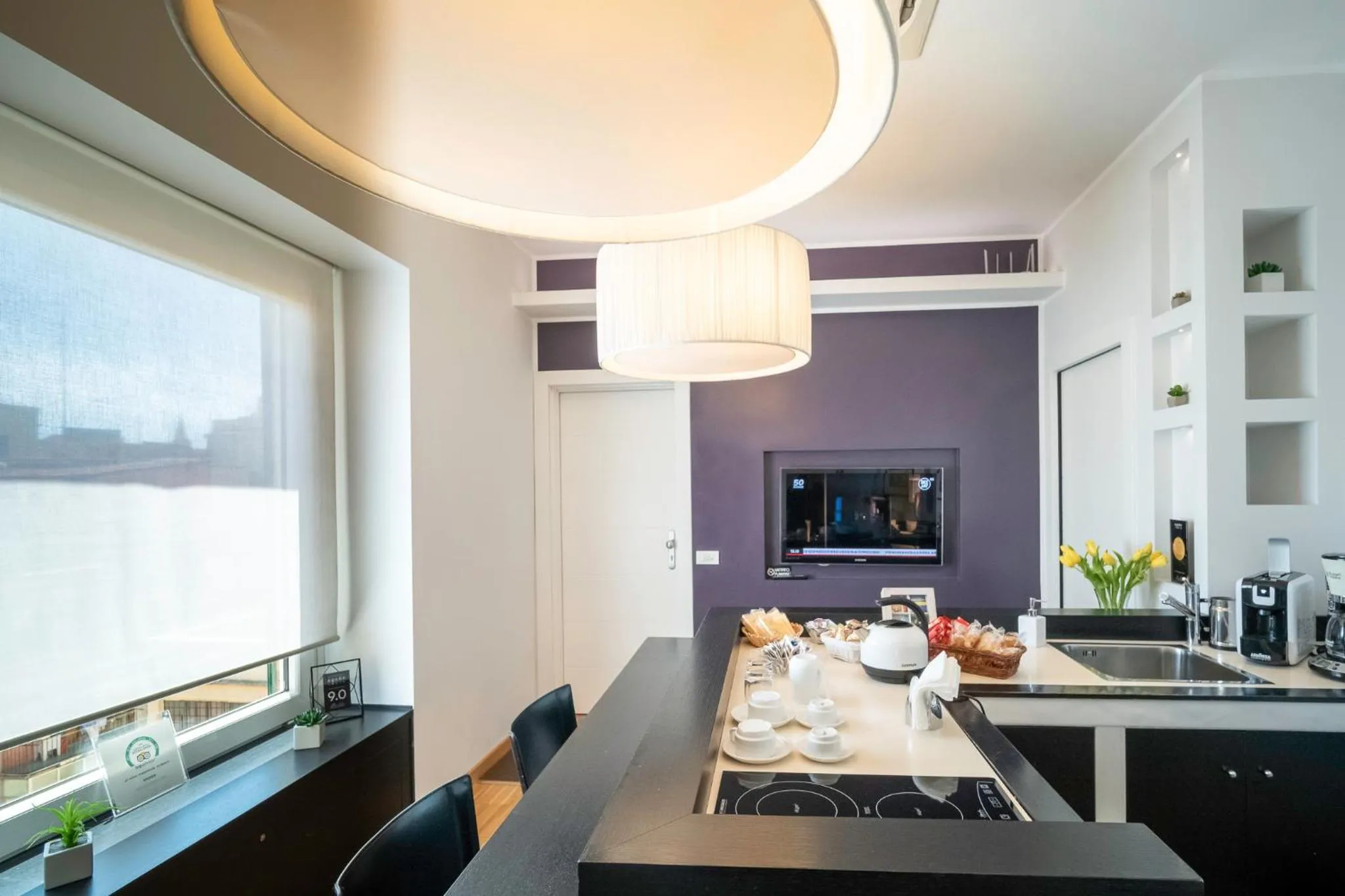 Communal lounge/ TV room in At Home Townhouse - Filiberto